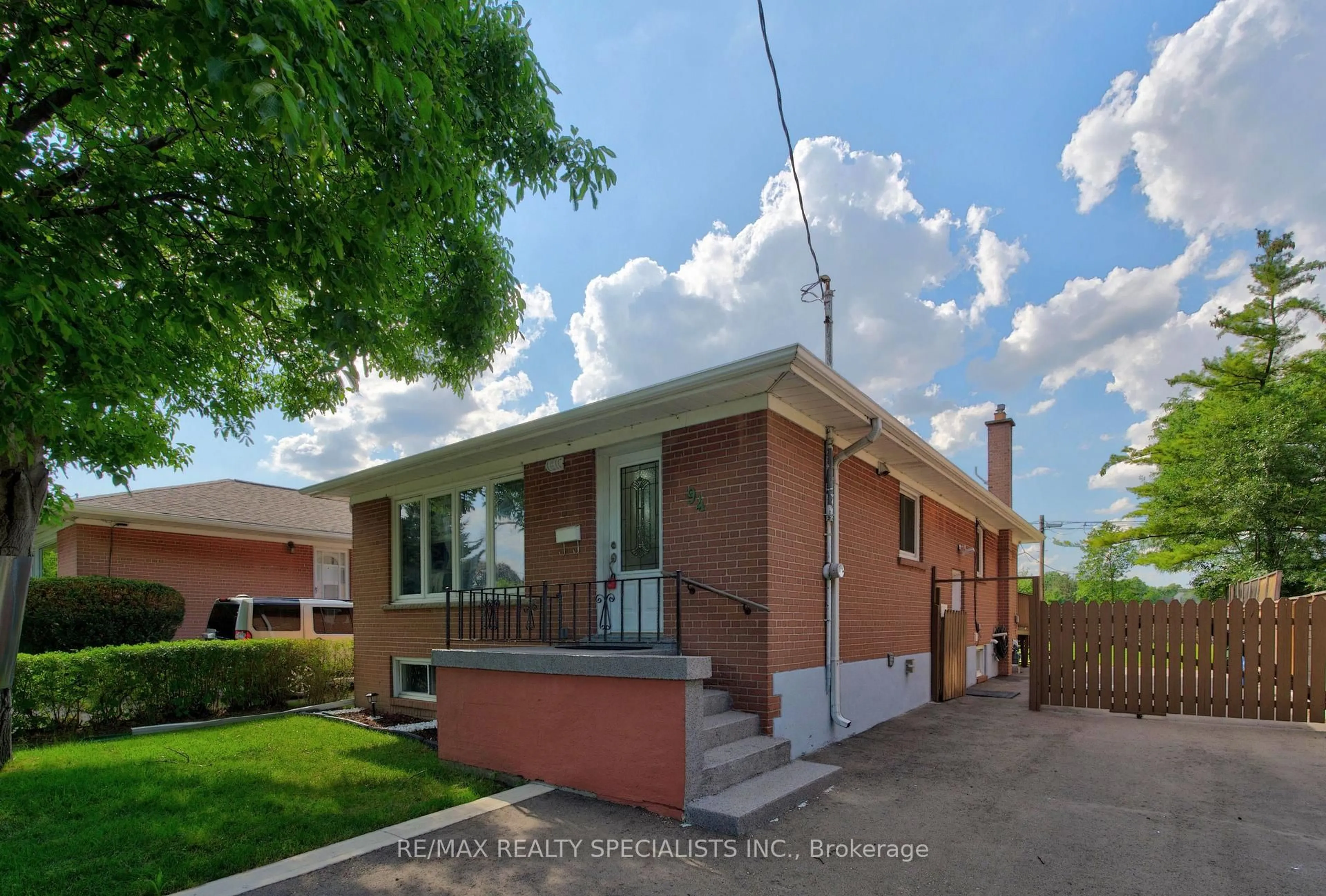 Home with brick exterior material, street for 94 Eringate Dr, Toronto Ontario M9C 3Z6