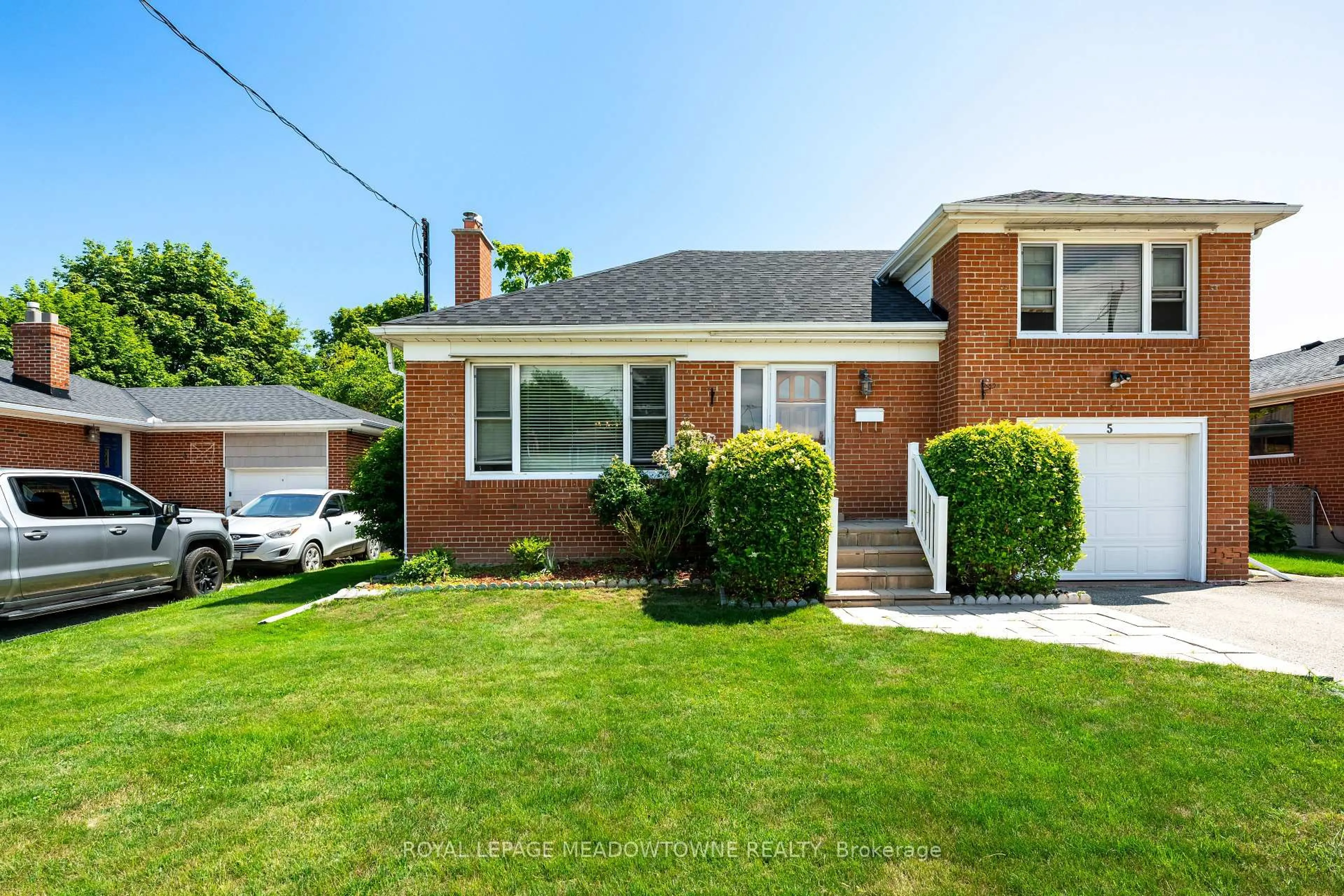 Home with brick exterior material, street for 5 Boreal Rd, Toronto Ontario M9C 2E9