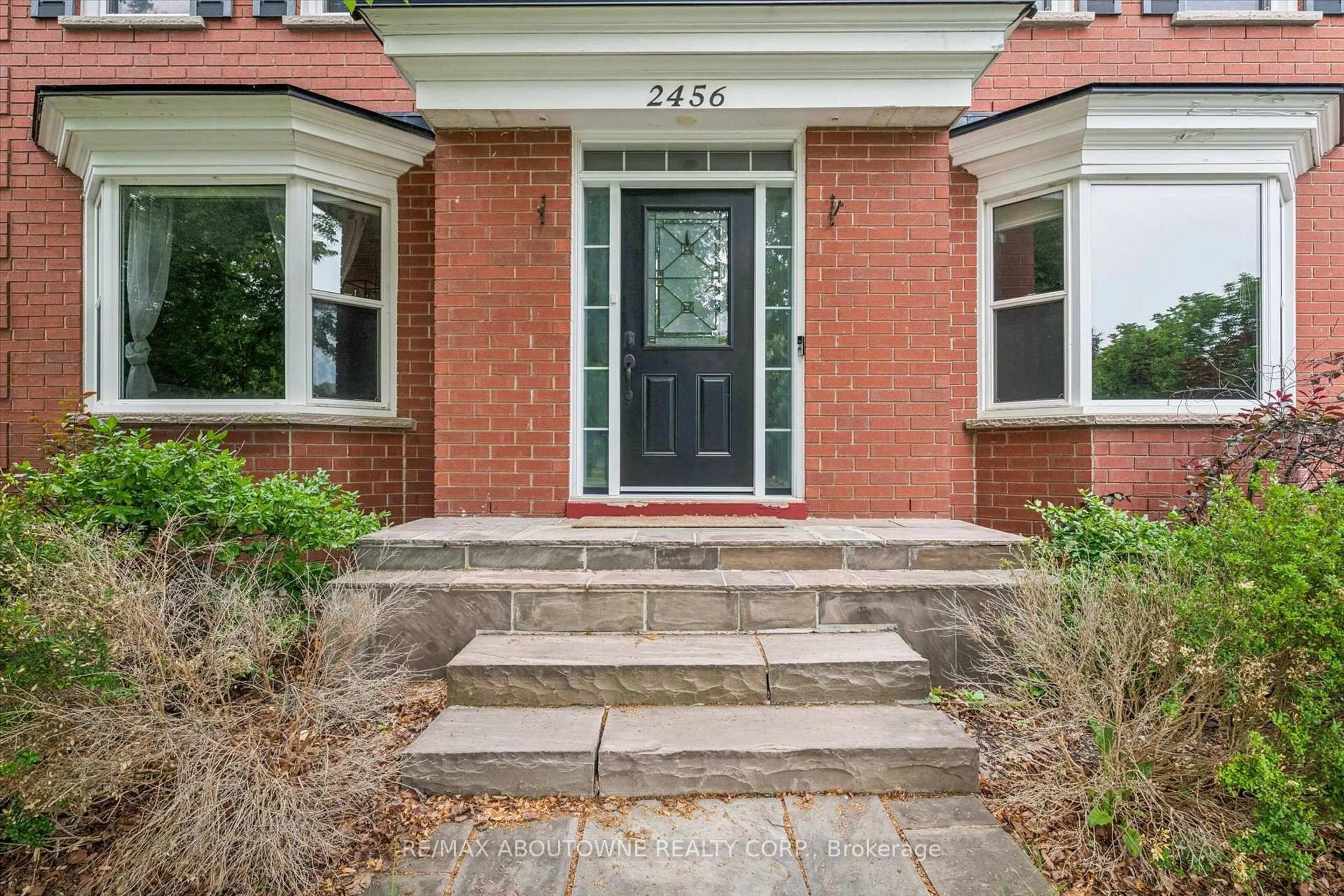 Home with brick exterior material, street for 2456 Sixth Line, Oakville Ontario L6H 5Z8