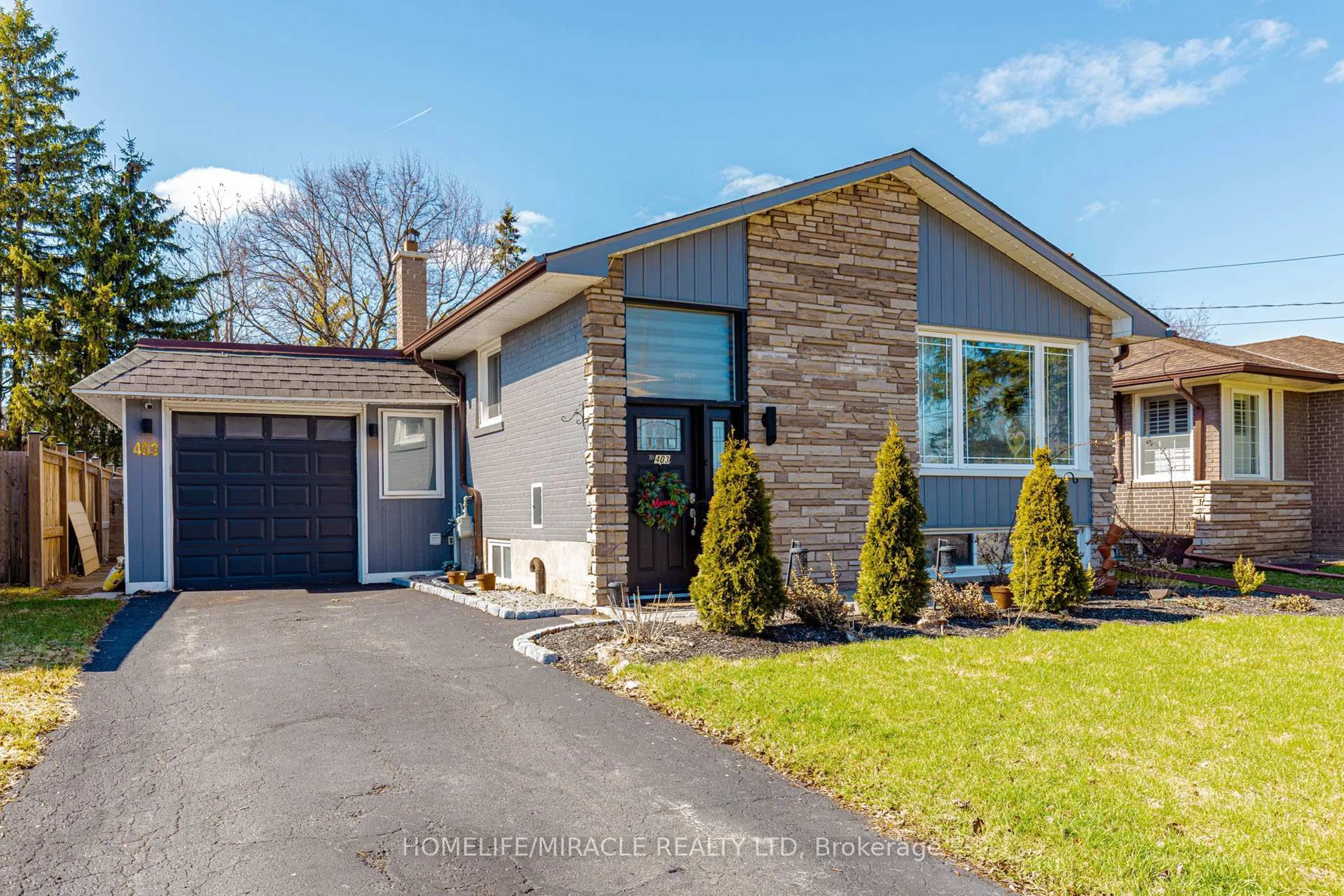 Home with brick exterior material, street for 403 Delrex Blvd, Halton Hills Ontario L7G 4H8