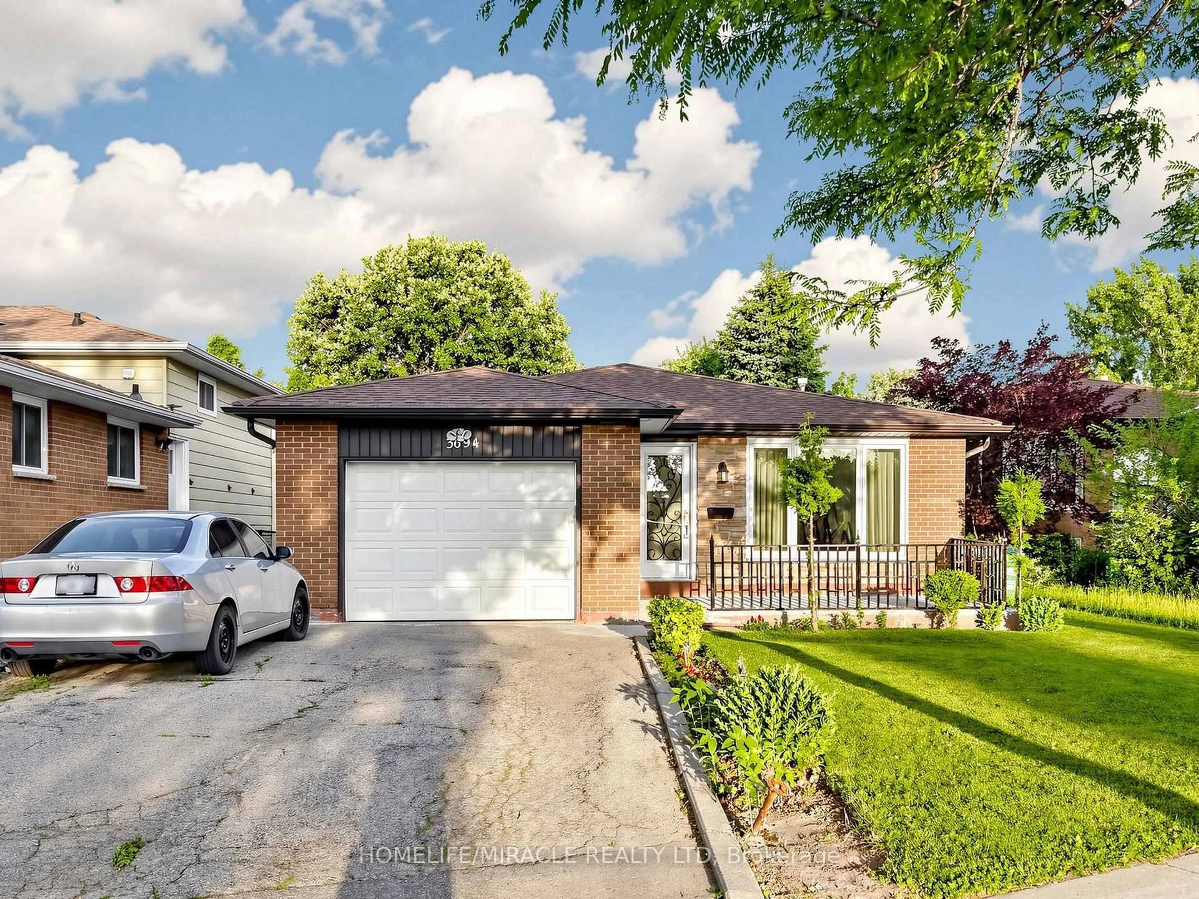 Home with brick exterior material, street for 3694 Brandon Gate Dr, Mississauga Ontario L4T 3M8