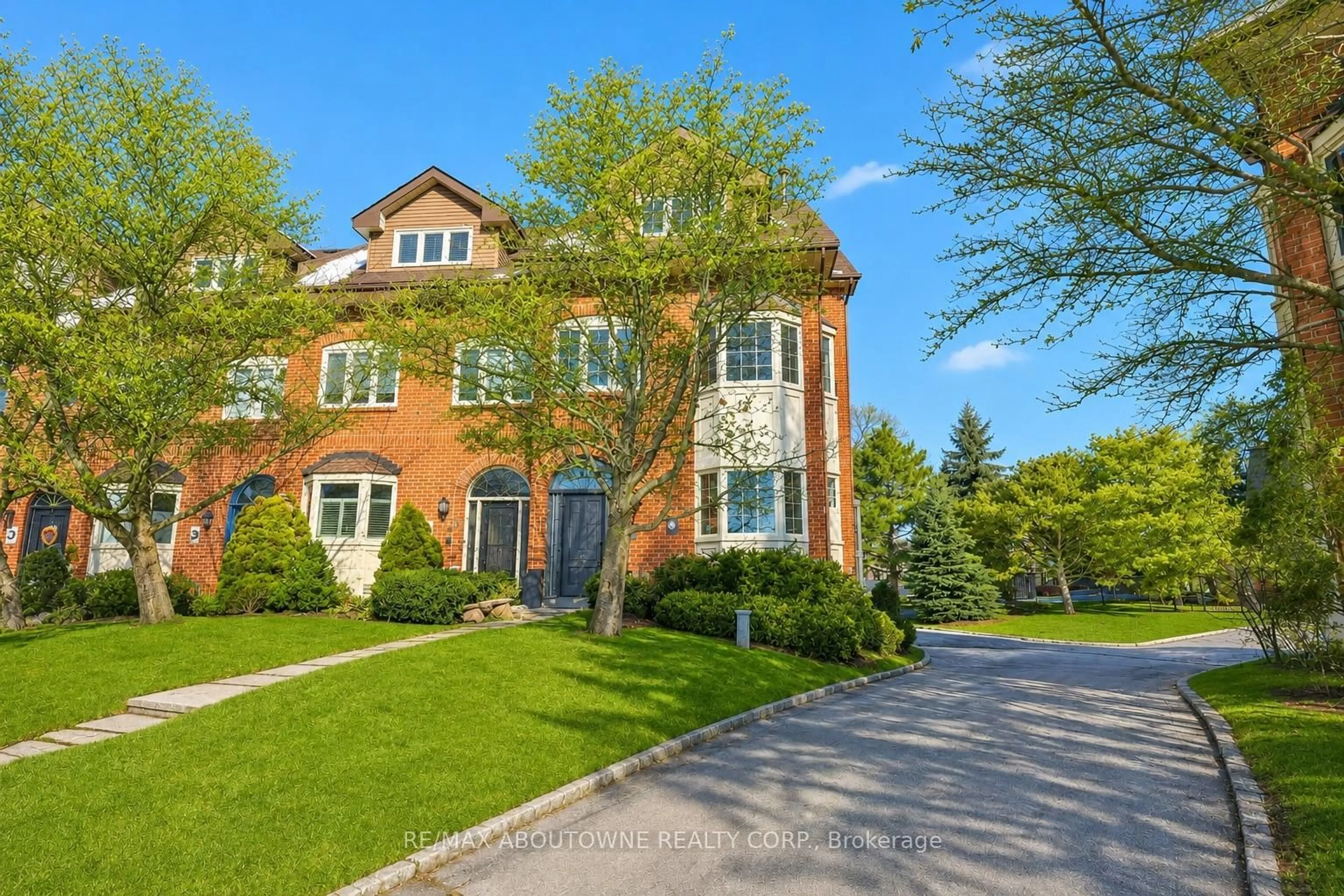 Home with brick exterior material, street for 63 Tradewind Dr, Oakville Ontario L6L 6K8