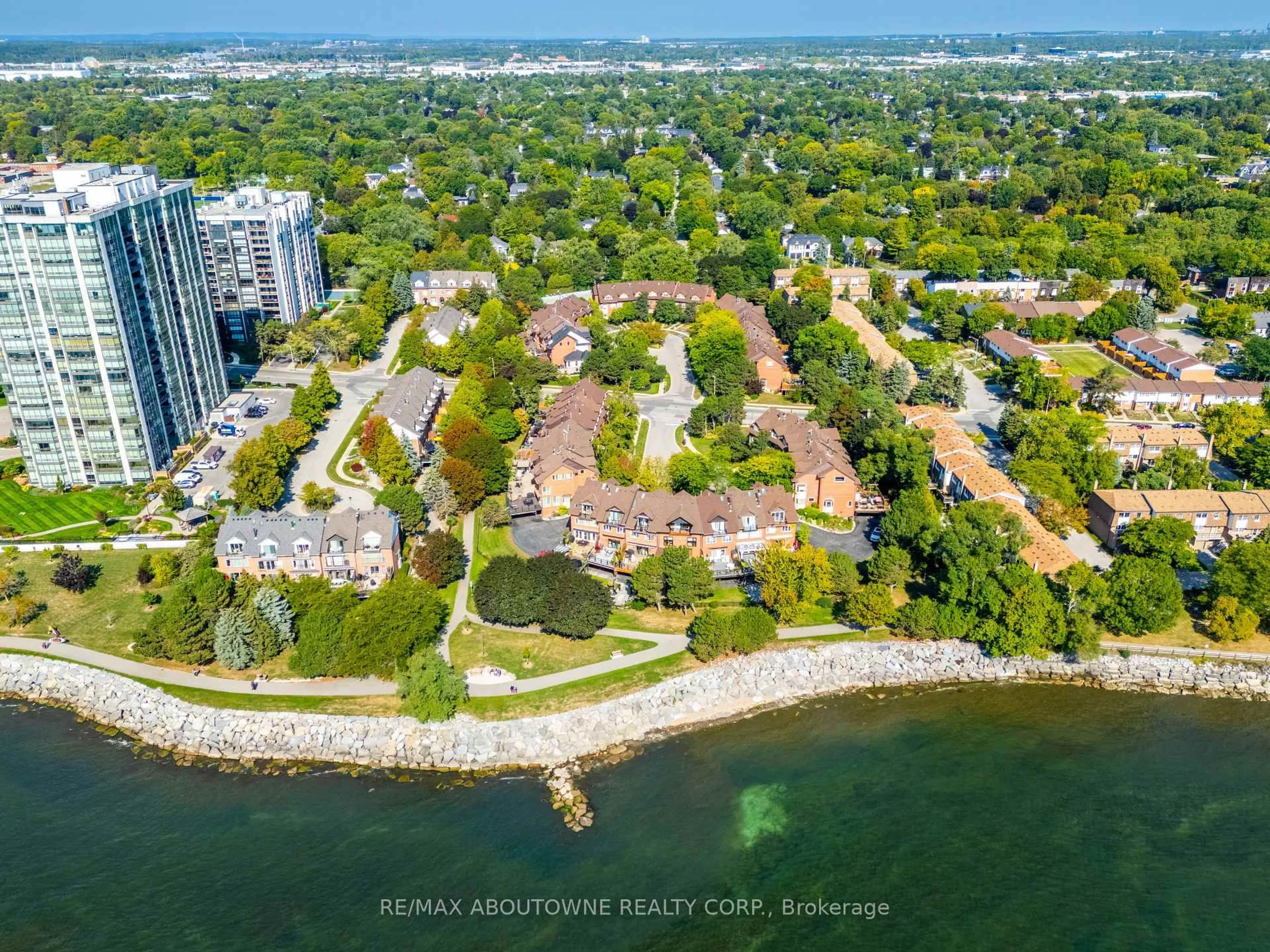 A pic from outside/outdoor area/front of a property/back of a property/a pic from drone, water/lake/river/ocean view for 63 Tradewind Dr, Oakville Ontario L6L 6K8