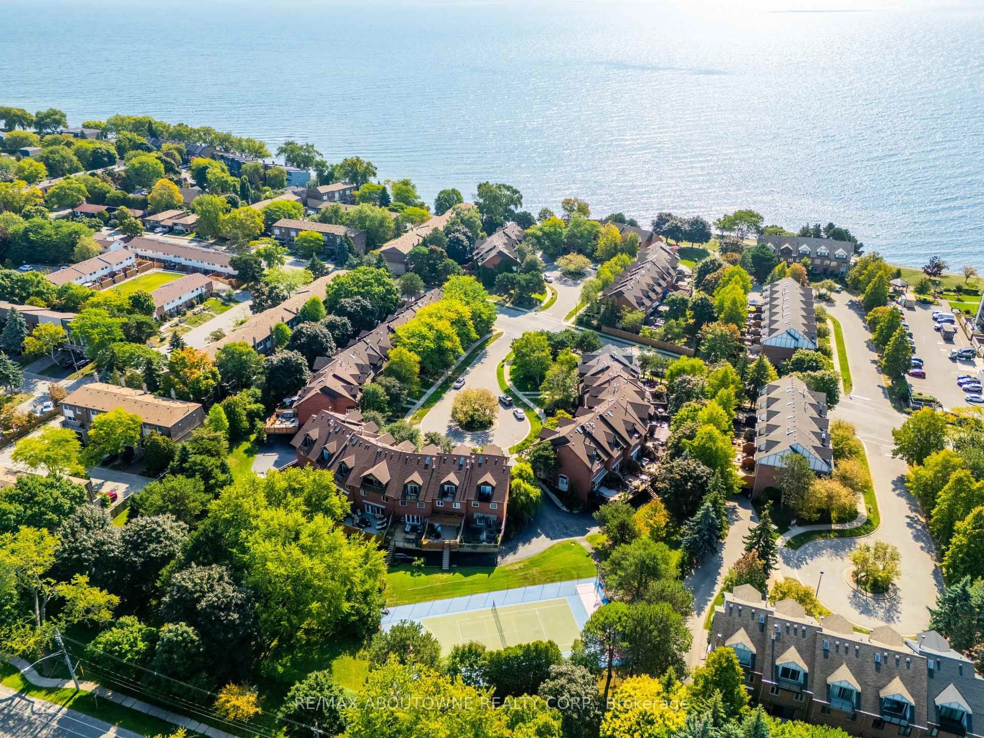 A pic from outside/outdoor area/front of a property/back of a property/a pic from drone, water/lake/river/ocean view for 63 Tradewind Dr, Oakville Ontario L6L 6K8