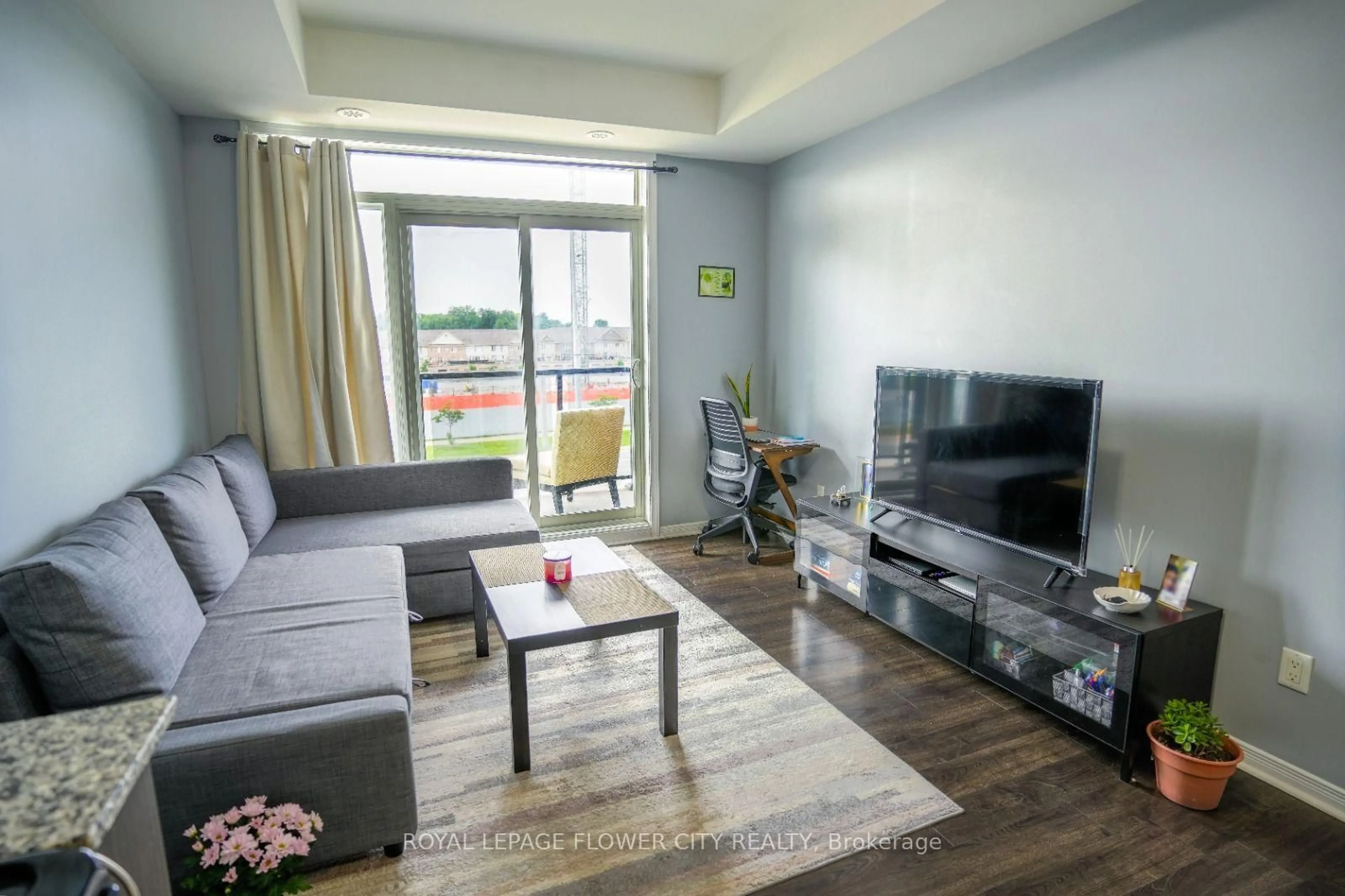 Living room with furniture, unknown for 54 Sky Harbour Dr #306, Brampton Ontario L6Y 6B9