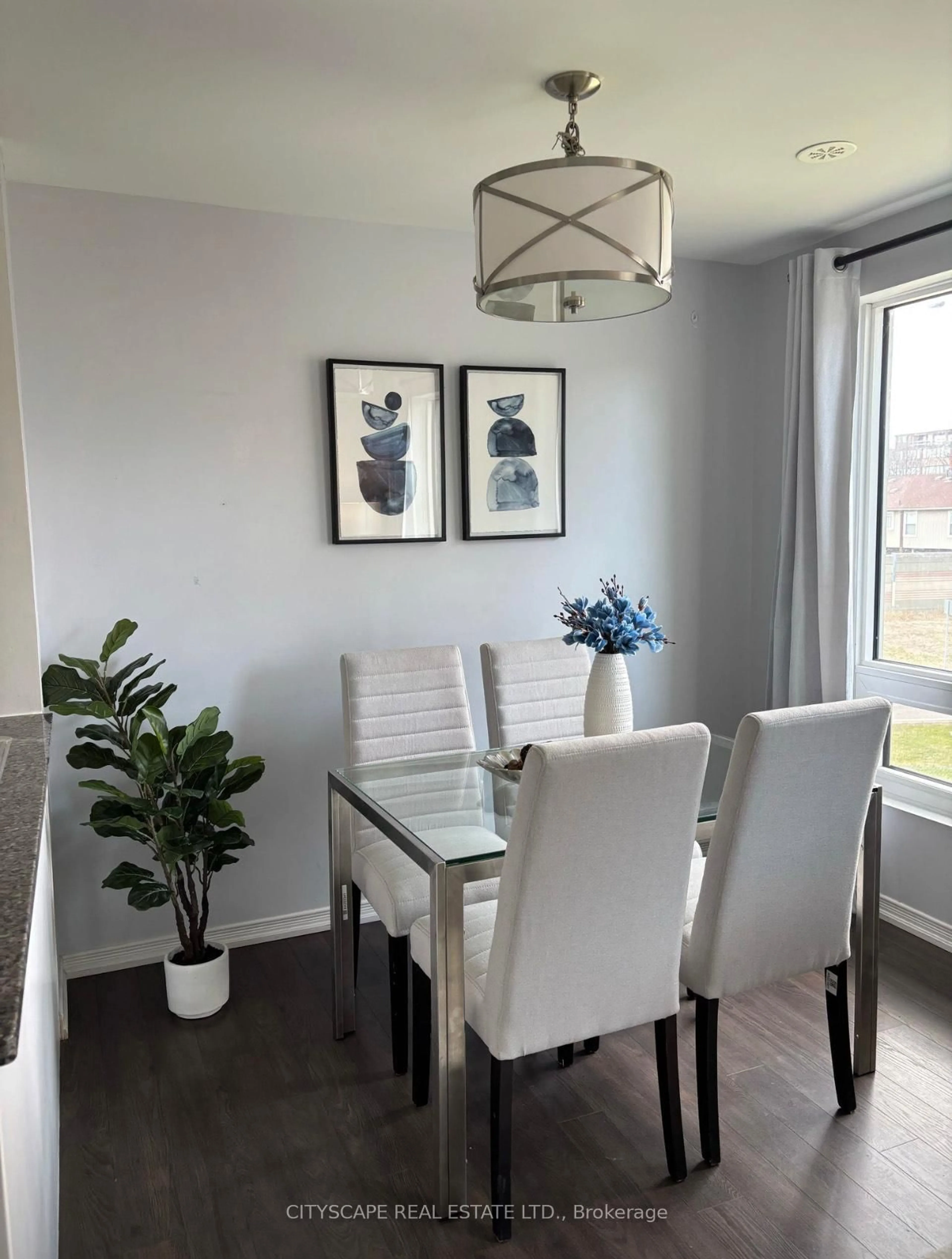 Dining room, wood/laminate floor for 7 Applewood Lane #213, Toronto Ontario M9C 0C1