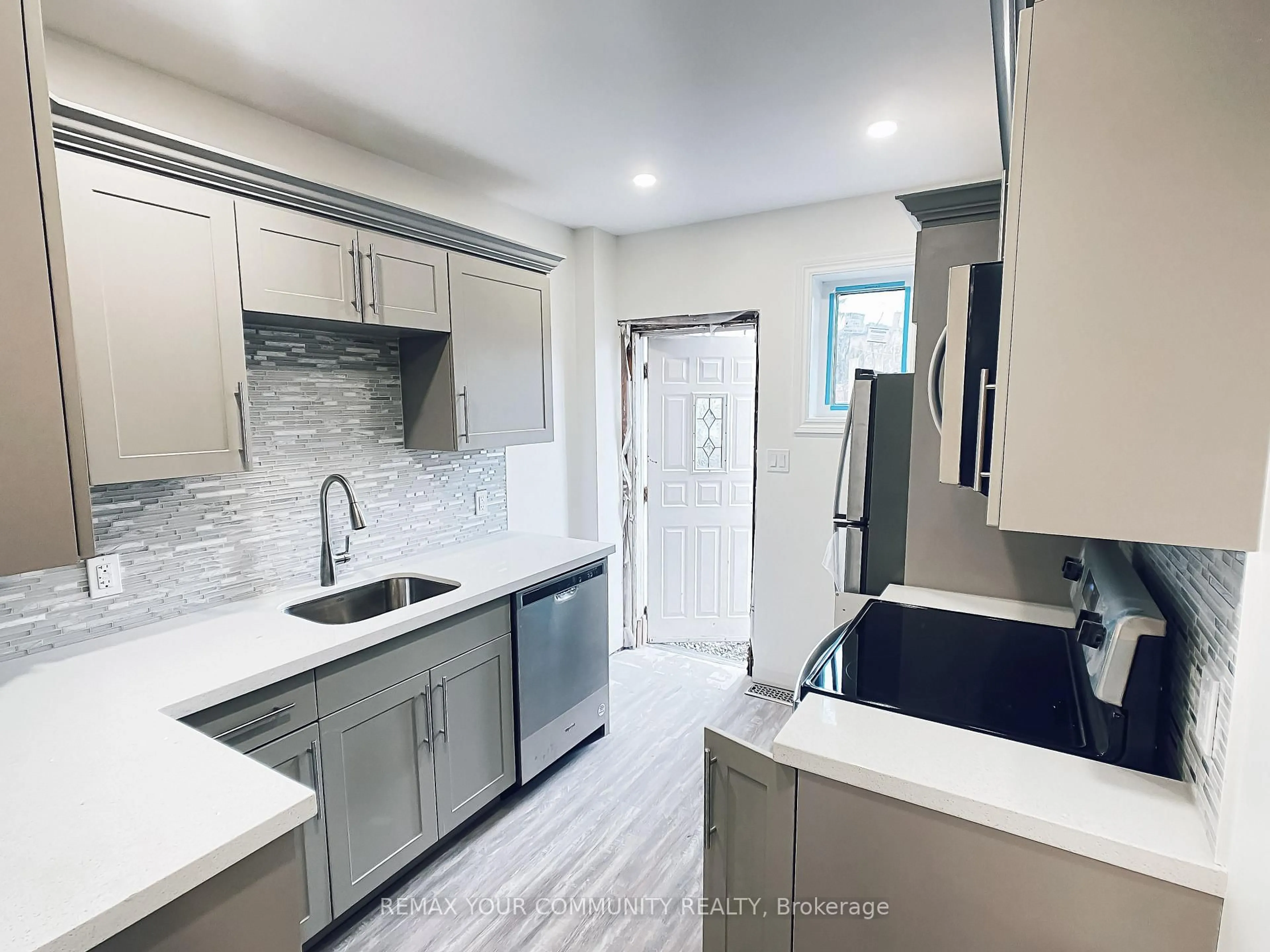 Open concept kitchen, ceramic/tile floor for 1623 Keele St, Toronto Ontario M6M 3V8
