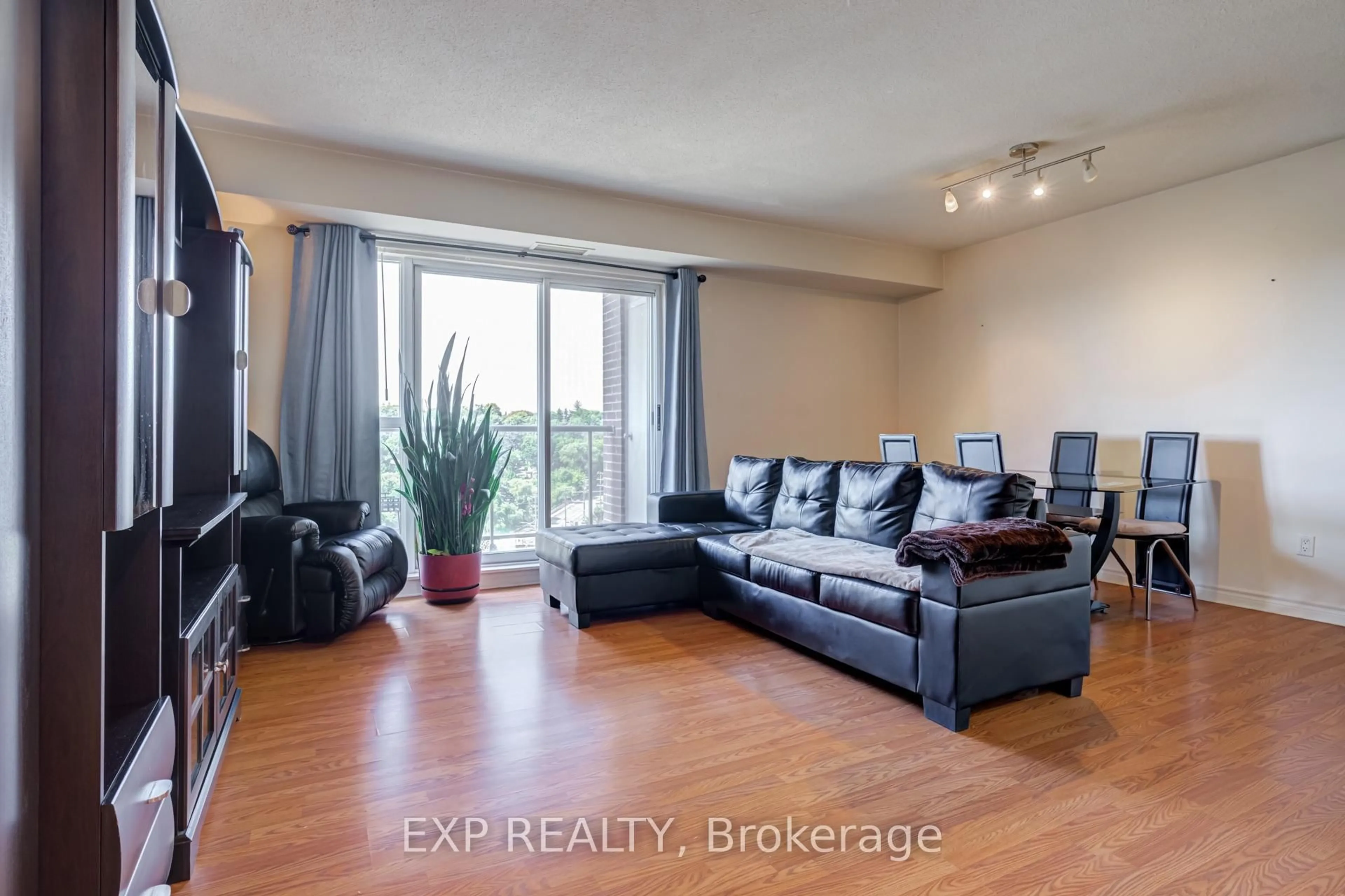 Living room with furniture, unknown for 2088 Lawrence Ave #707, Toronto Ontario M9N 3Z9