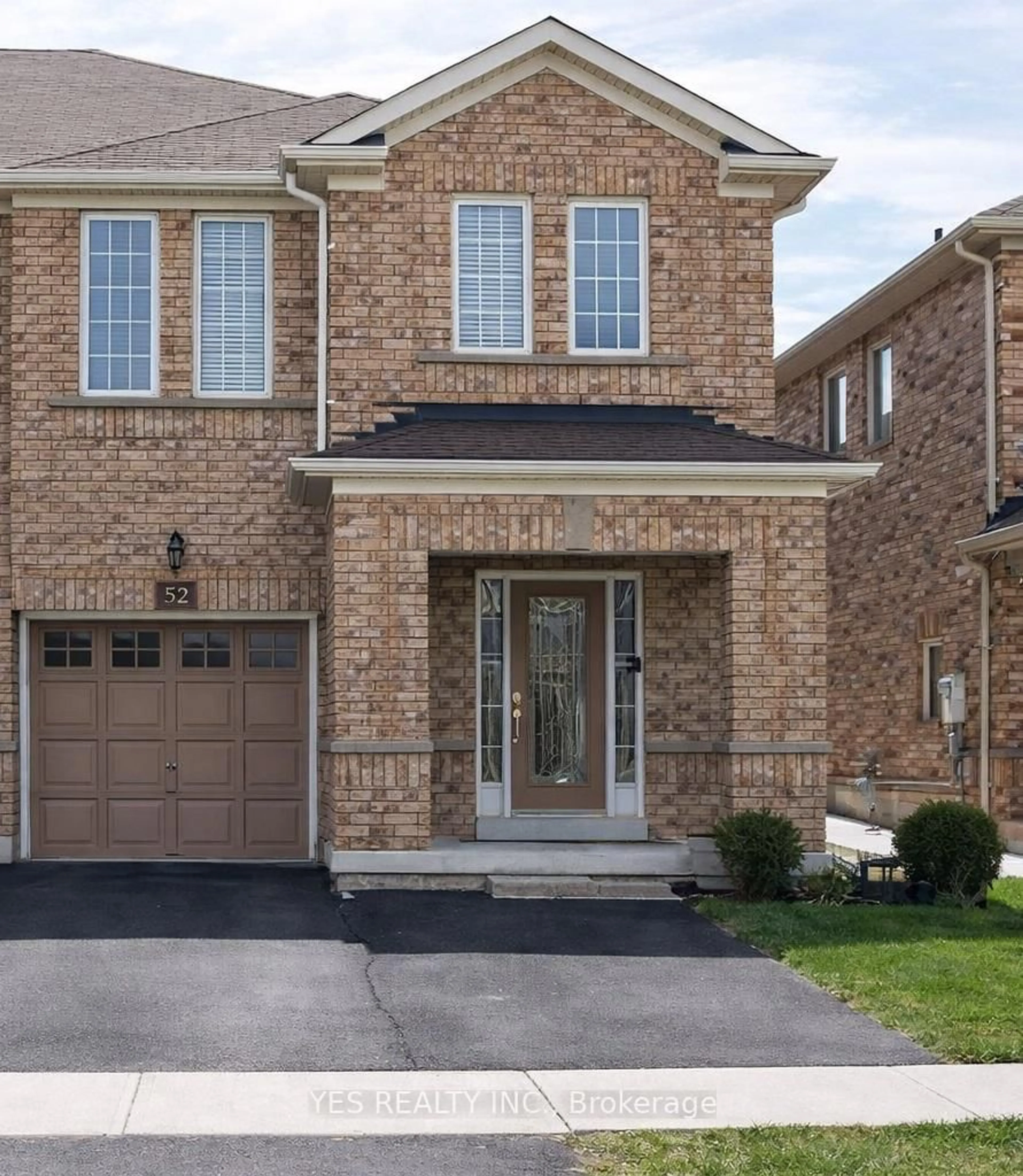 Home with brick exterior material, street for 52 Hollingsworth Circ, Brampton Ontario L7A 0J7