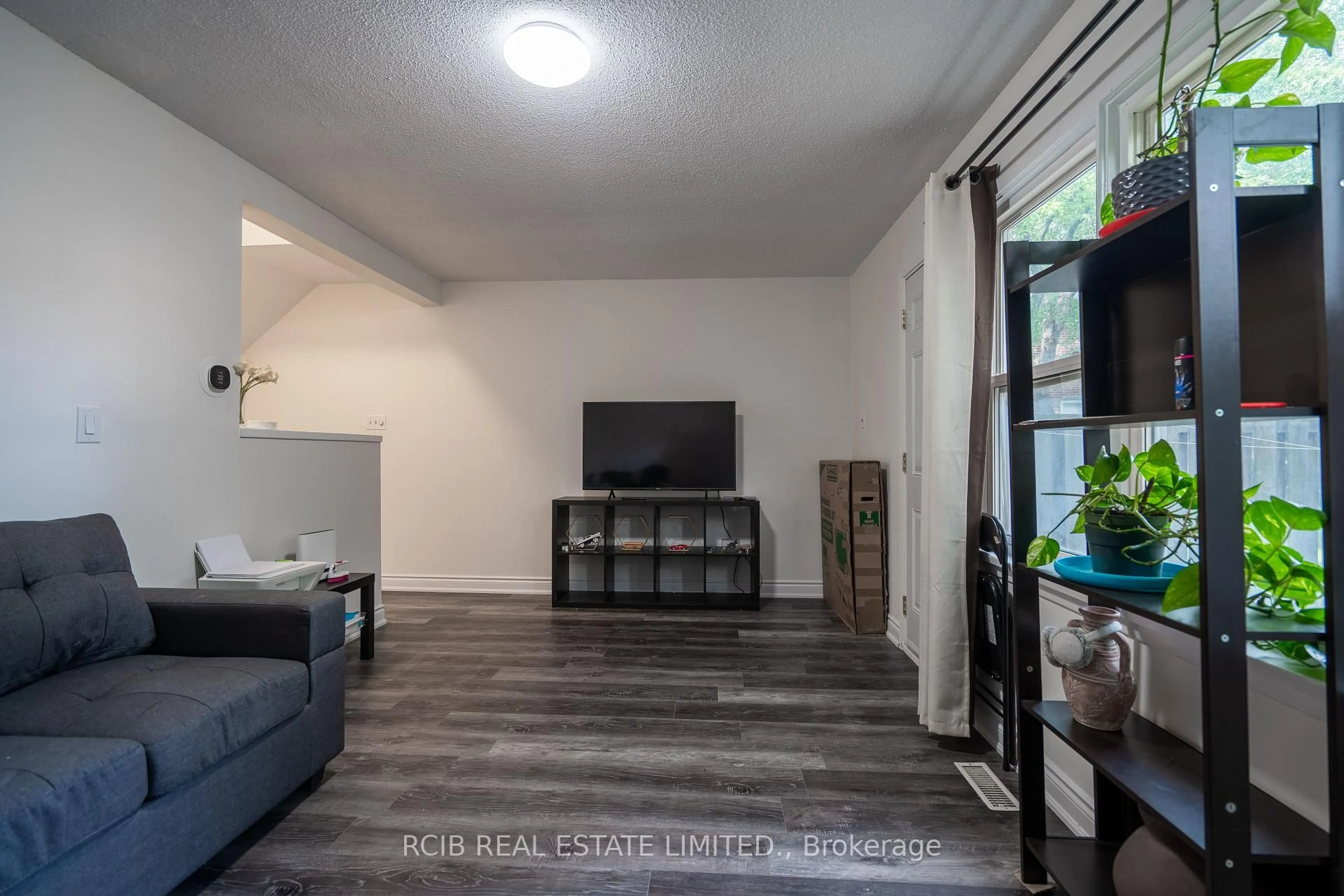 Living room with furniture, unknown for 38 Eden Park, Brampton Ontario L6T 3A5