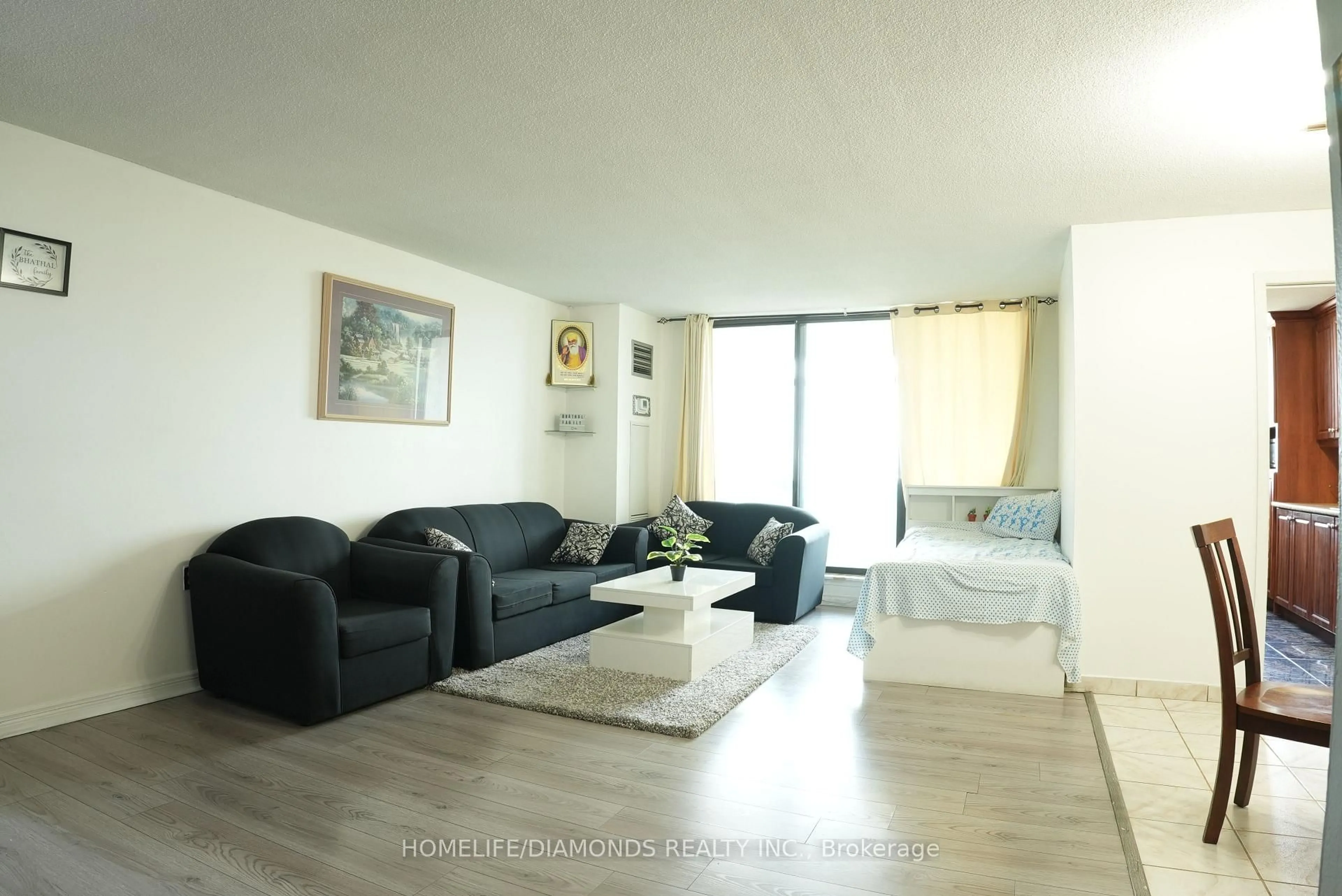 Living room with furniture, unknown for 18 Knightsbridge Rd #1411, Brampton Ontario L6T 3X5