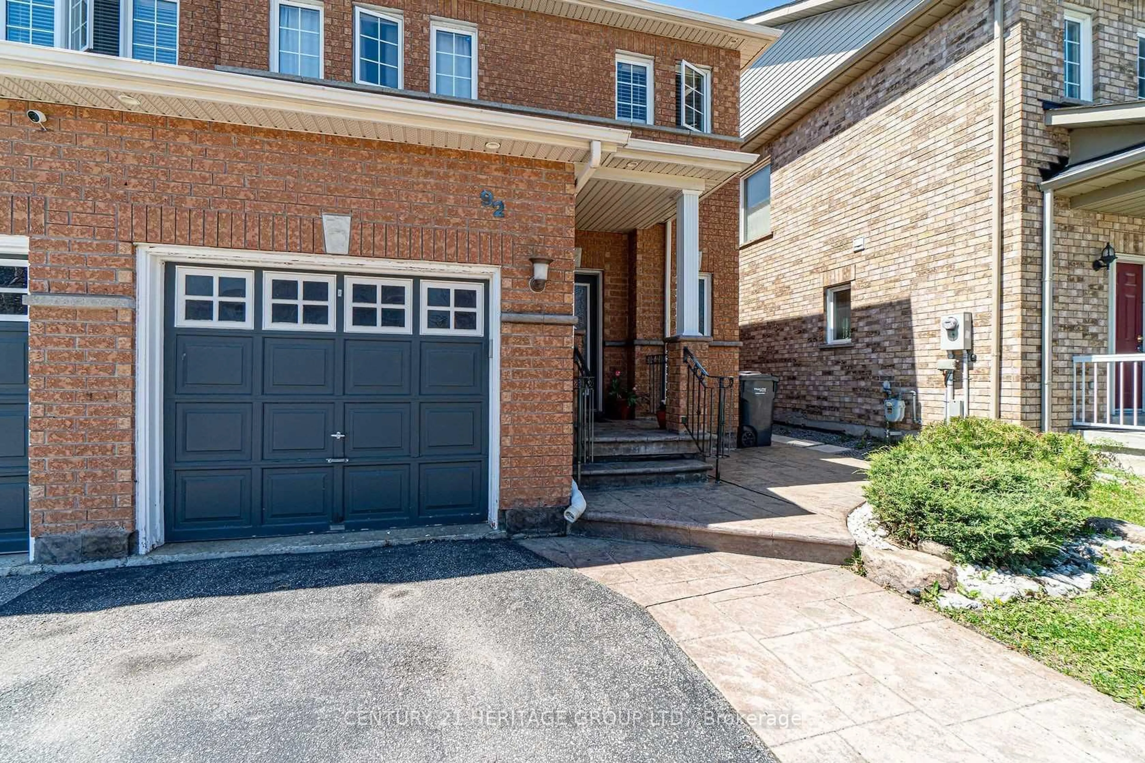 Home with brick exterior material, street for 92 Sewells Lane, Brampton Ontario L7A 2Z7