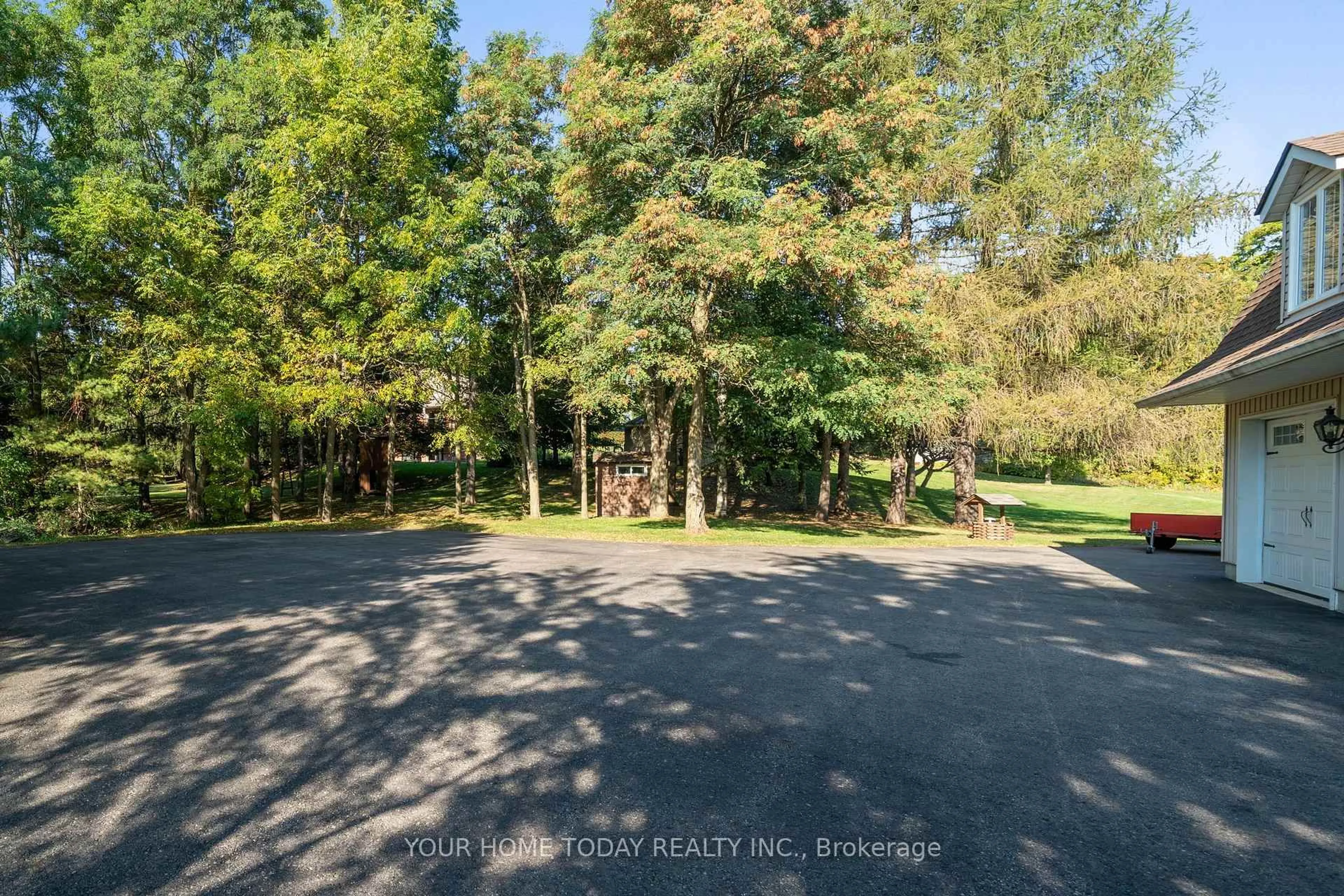A pic from outside/outdoor area/front of a property/back of a property/a pic from drone, forest/trees view for 12609 Fifth Line, Halton Hills Ontario L0P 1H0