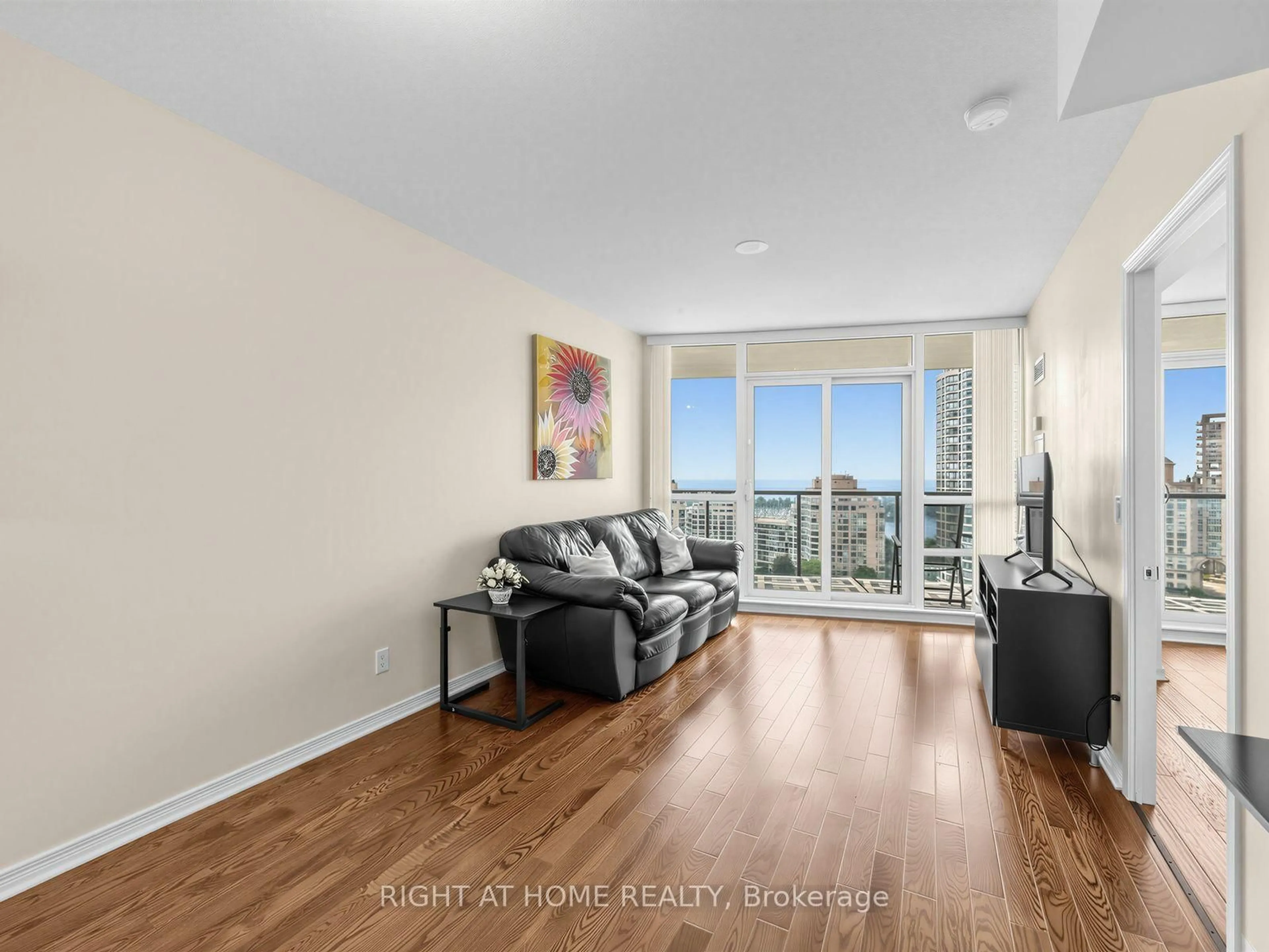 Living room with furniture, wood/laminate floor for 15 Legion Rd #1601, Toronto Ontario M8V 0A9
