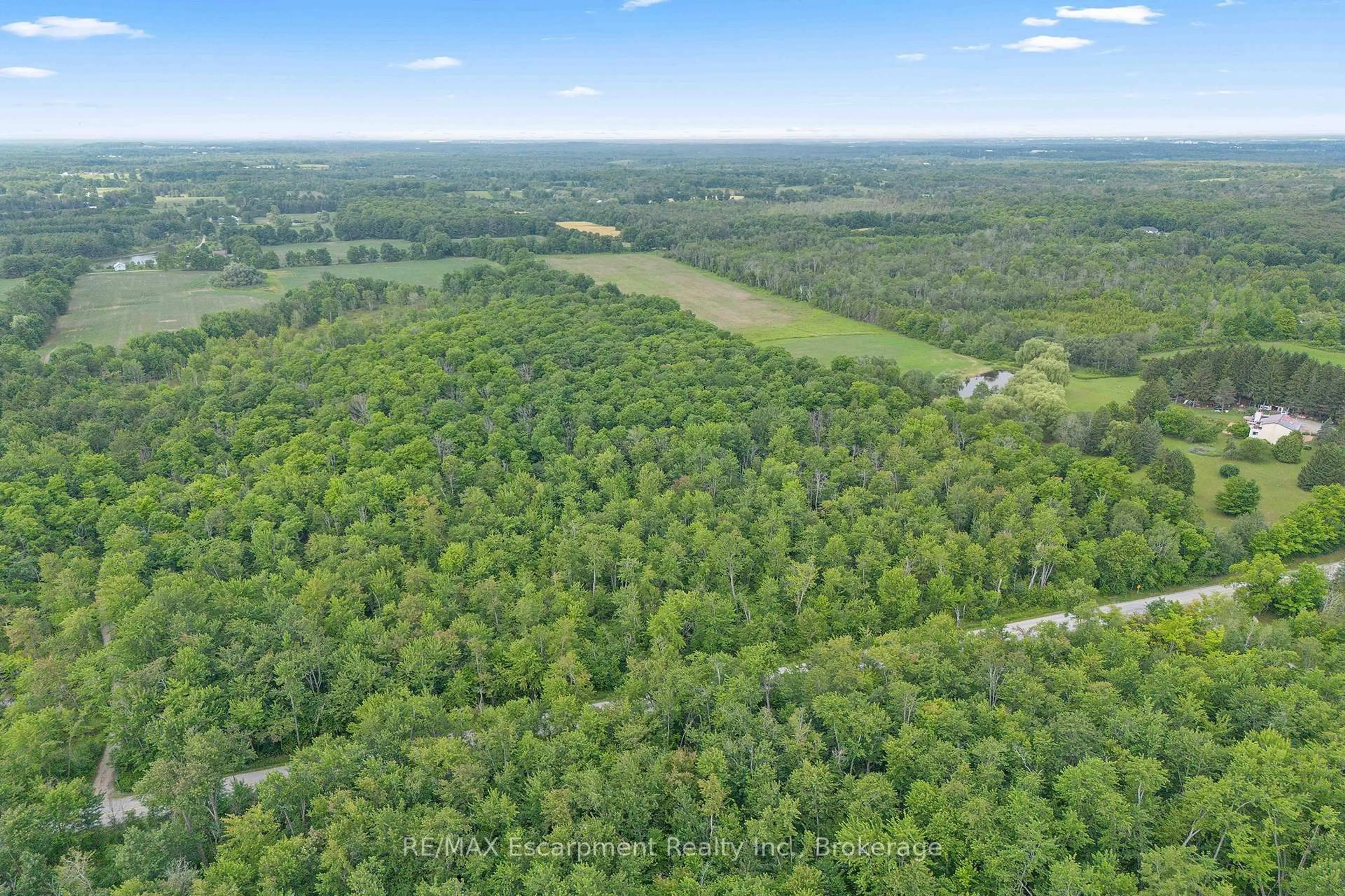 A pic from outside/outdoor area/front of a property/back of a property/a pic from drone, forest/trees view for -- Fourth Line Nassagaweya, Milton Ontario N0B 2K0