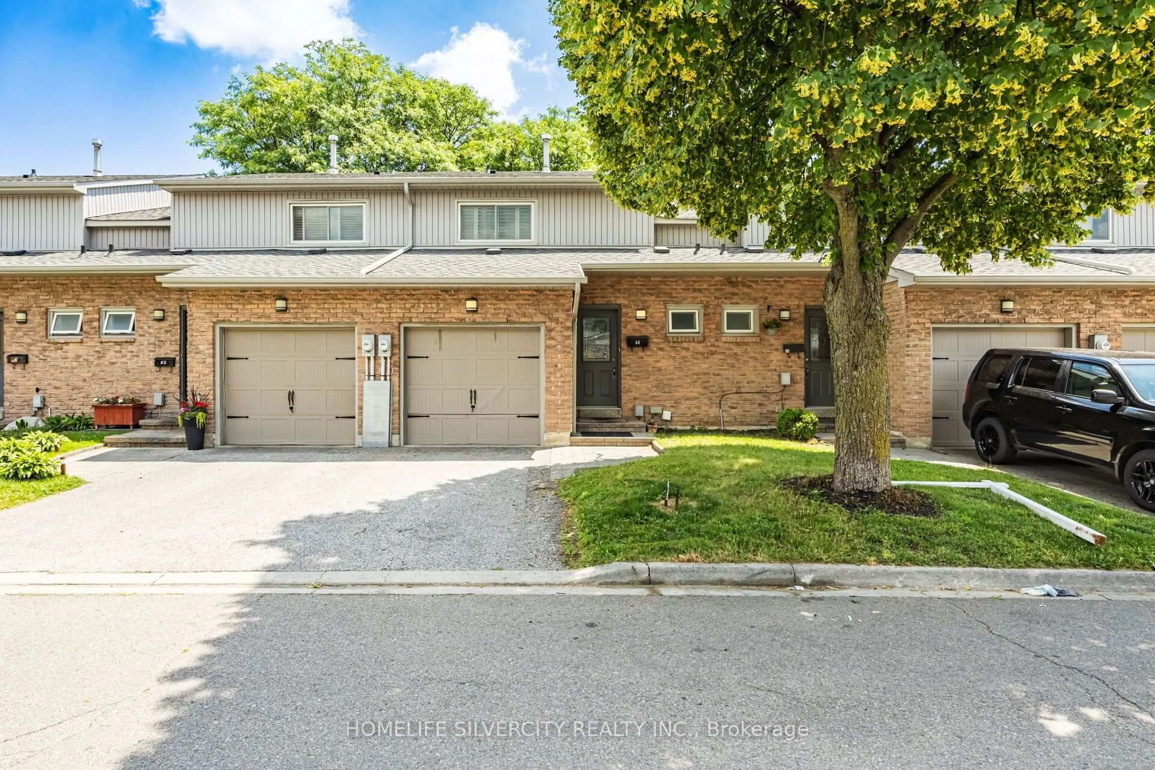 Home with brick exterior material, street for 399 Vodden St #64, Brampton Ontario L6V 3V1