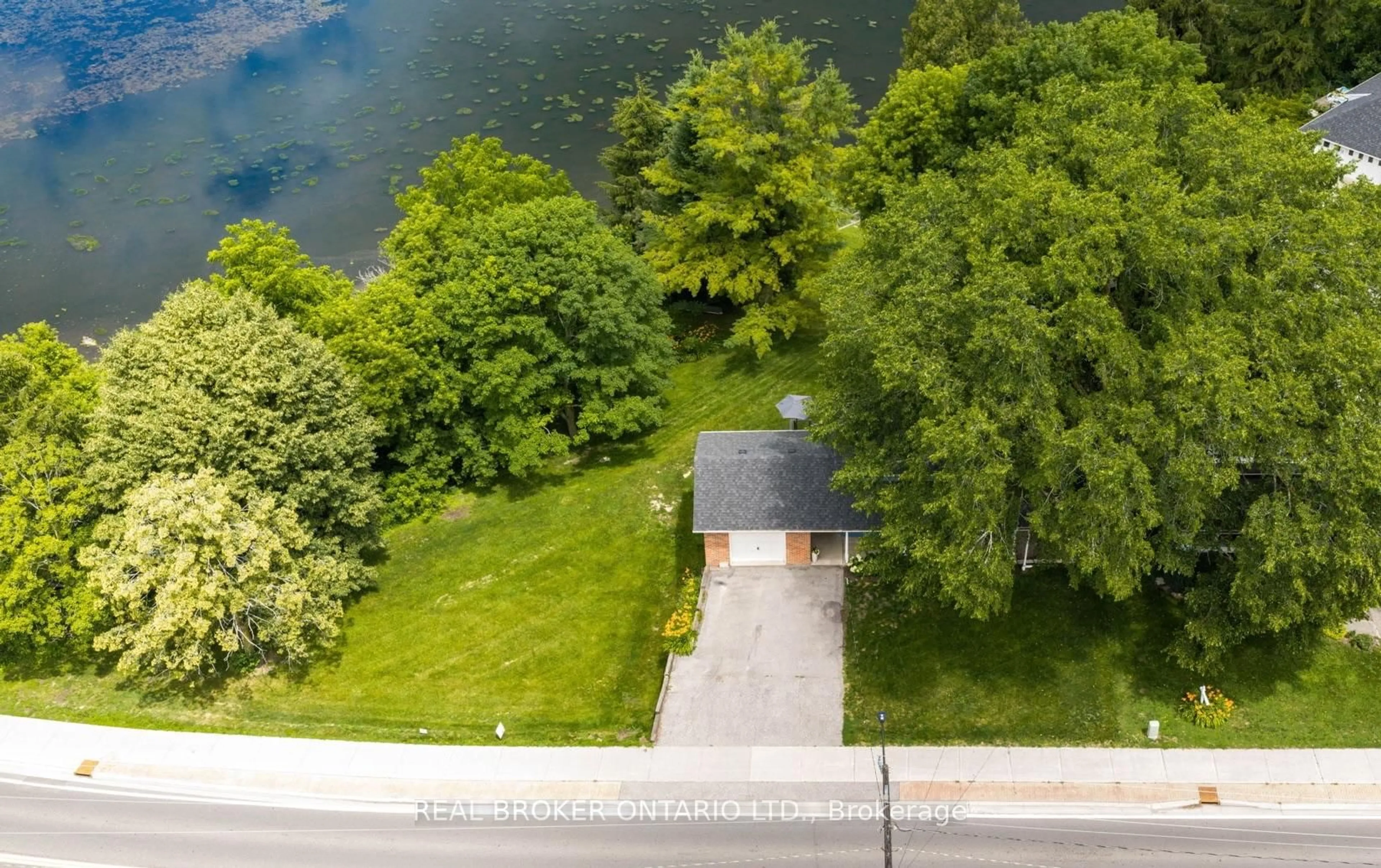 A pic from outside/outdoor area/front of a property/back of a property/a pic from drone, water/lake/river/ocean view for 17265 50 Highway, Caledon Ontario L7E 0K9