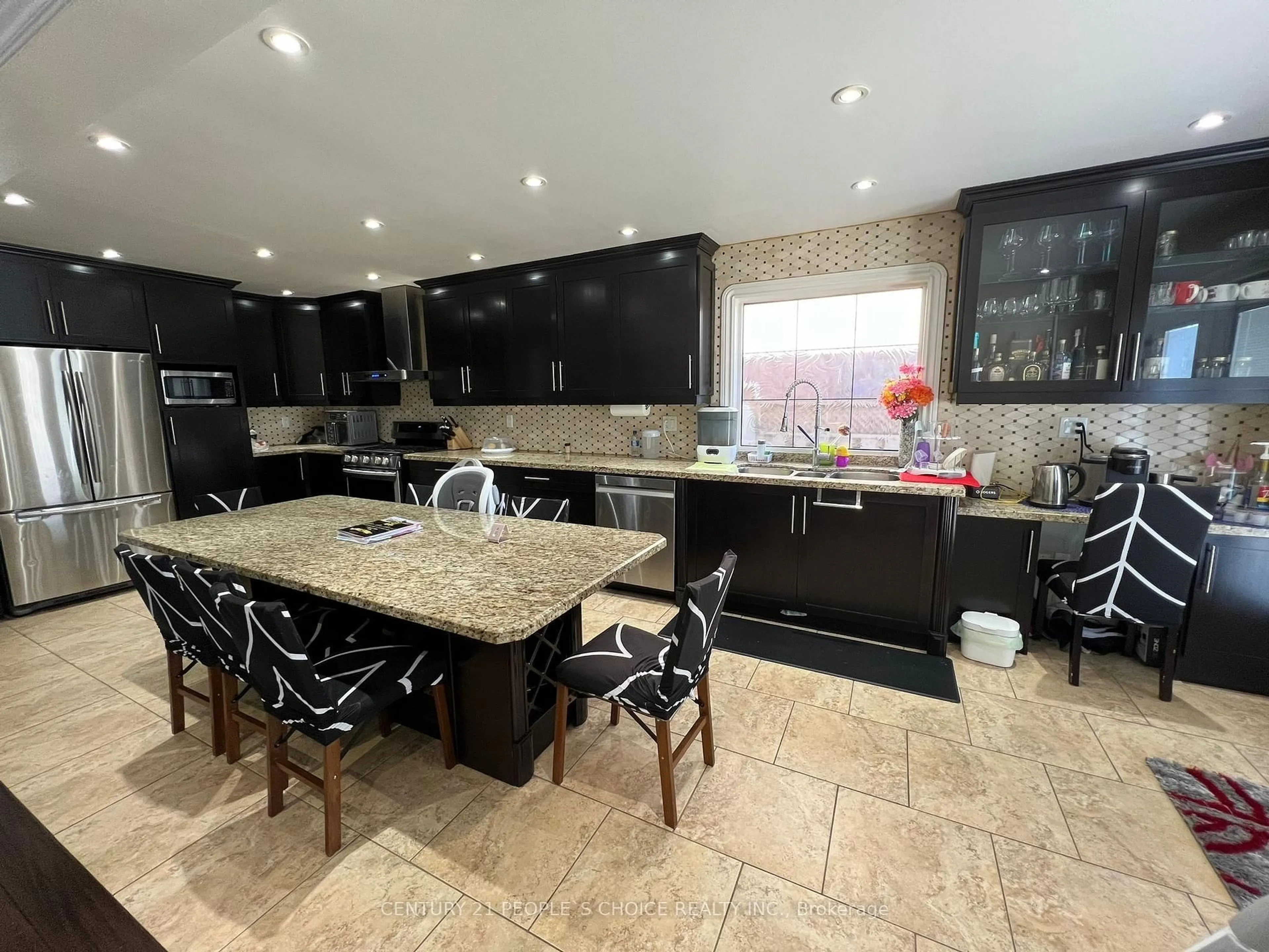 Open concept kitchen, ceramic/tile floor for 57 Fallstar Cres, Brampton Ontario L7A 2J7