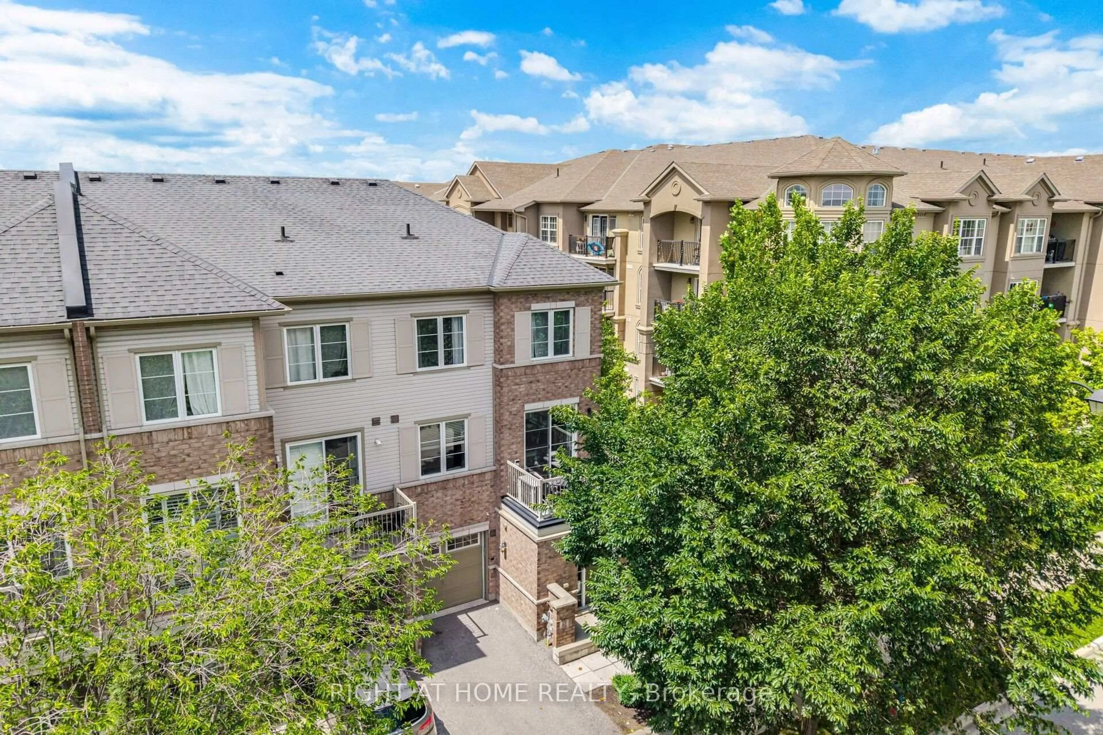 A pic from outside/outdoor area/front of a property/back of a property/a pic from drone, city buildings view from balcony for 165 Hampshire Way #153, Milton Ontario L9T 8M7
