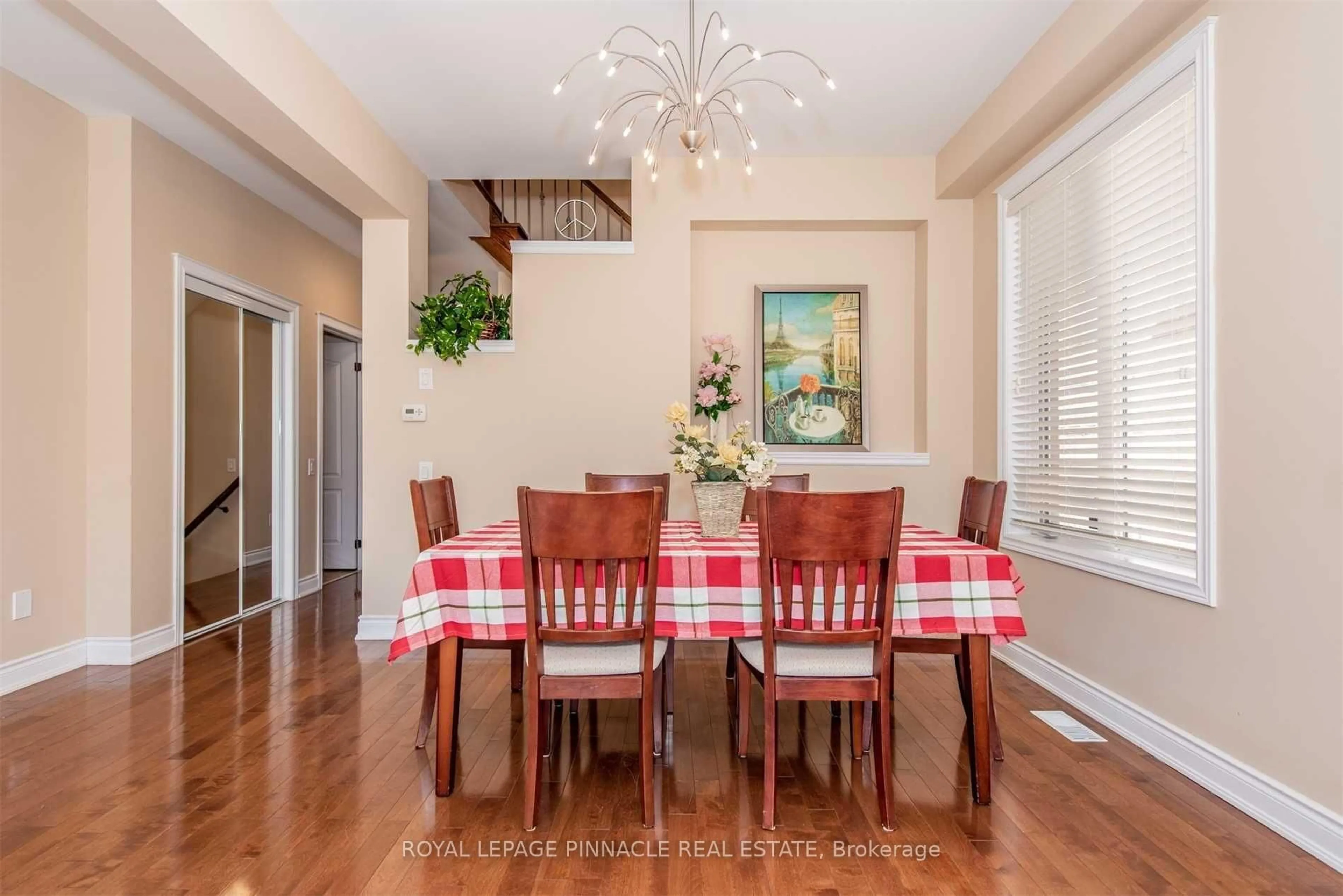 Dining room, wood/laminate floor for 3347 Whilabout Terr, Oakville Ontario L6L 0A8