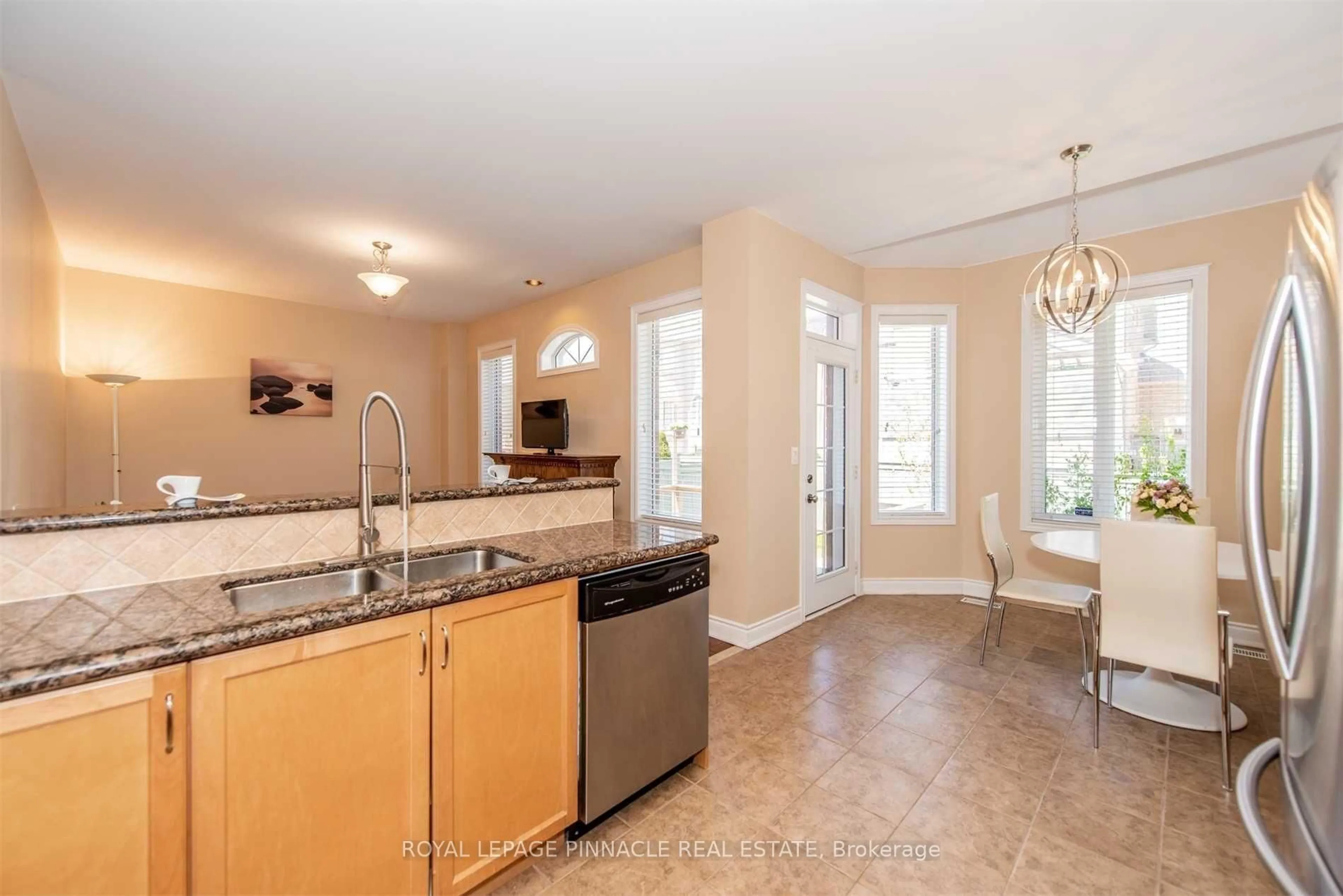 Open concept kitchen, ceramic/tile floor for 3347 Whilabout Terr, Oakville Ontario L6L 0A8