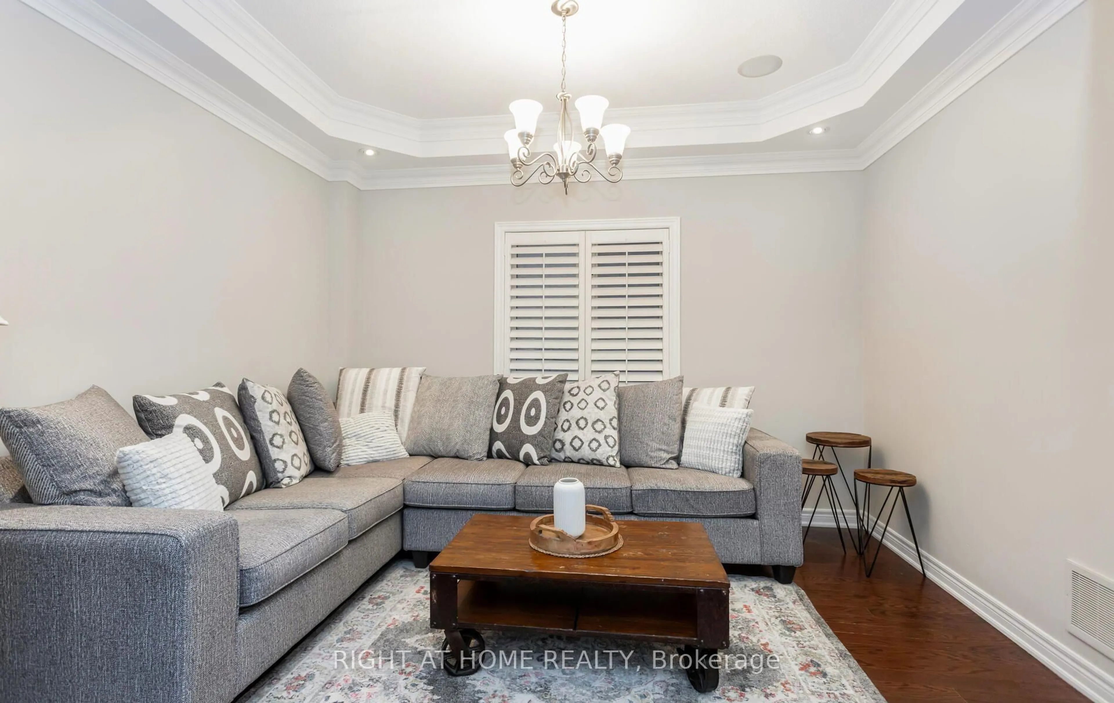 Living room with furniture, wood/laminate floor for 2419 Wasaga Dr, Oakville Ontario L6H 0B8