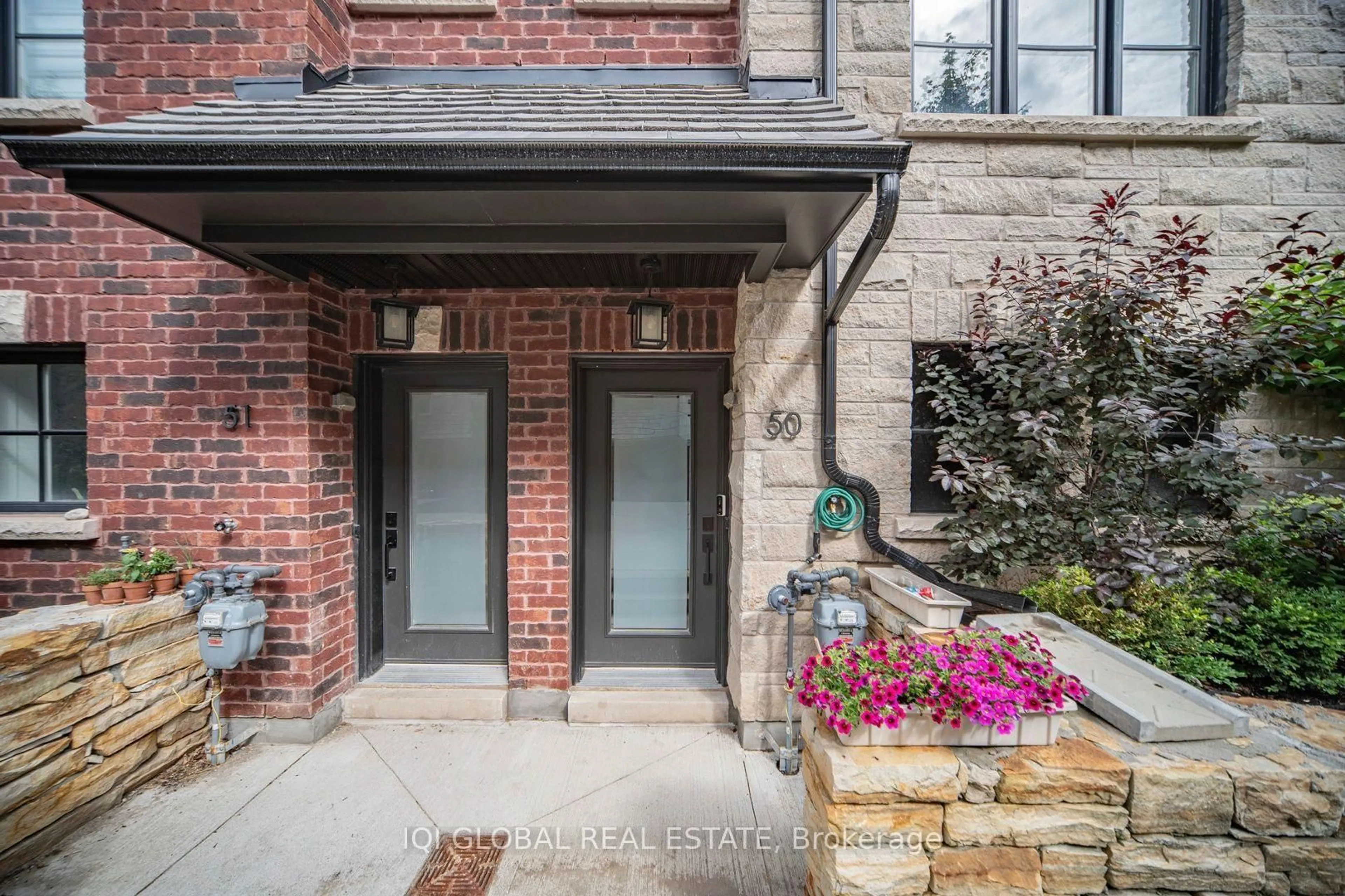 Home with brick exterior material, street for 30 Lunar Cres #50, Mississauga Ontario L5M 2P6