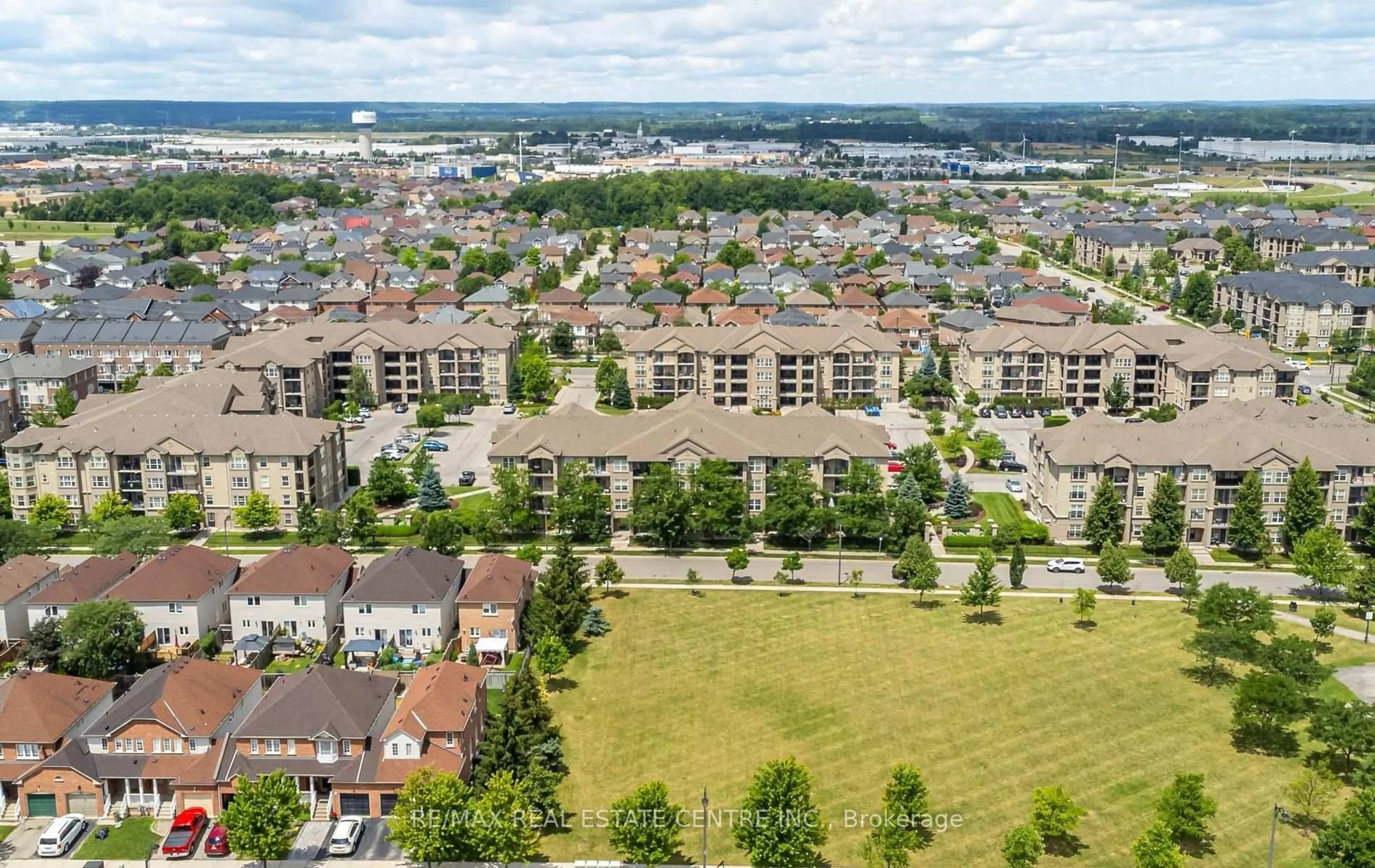 A pic from outside/outdoor area/front of a property/back of a property/a pic from drone, city buildings view from balcony for 1370 Main St #205, Milton Ontario L9T 7S8
