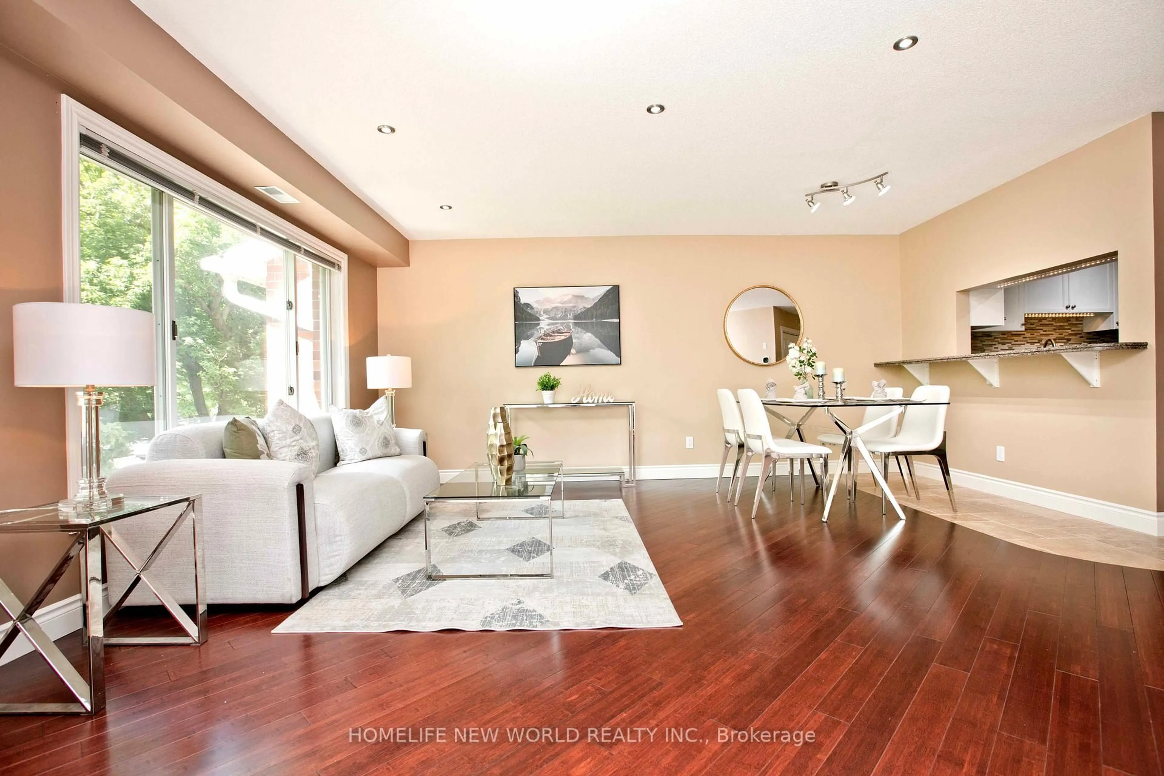 Living room with furniture, wood/laminate floor for 2120 Headon Rd #18, Burlington Ontario L7M 4J9