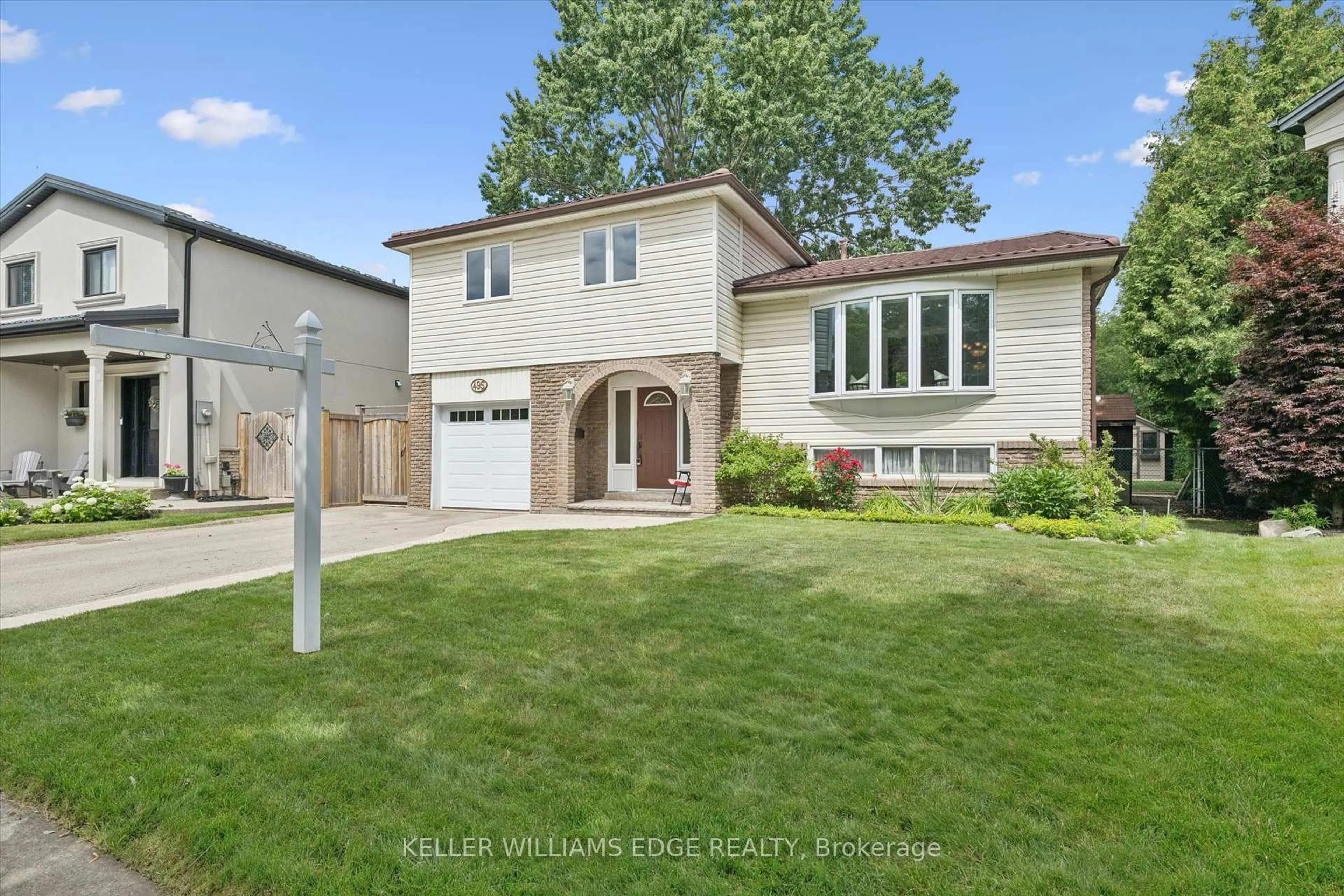 Home with brick exterior material, street for 495 Tipperton Cres, Oakville Ontario L6L 5E1
