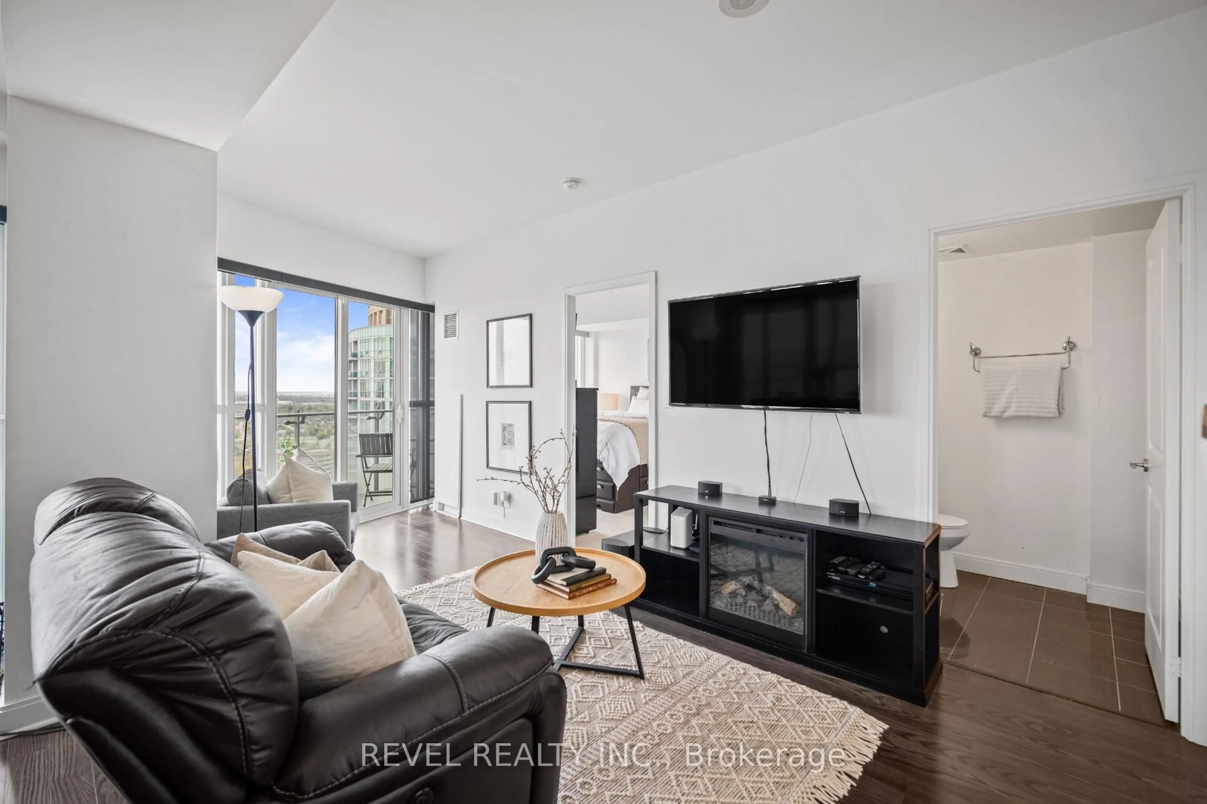 Living room with furniture, unknown for 50 Absolute Ave #2802, Mississauga Ontario L4Z 0A8