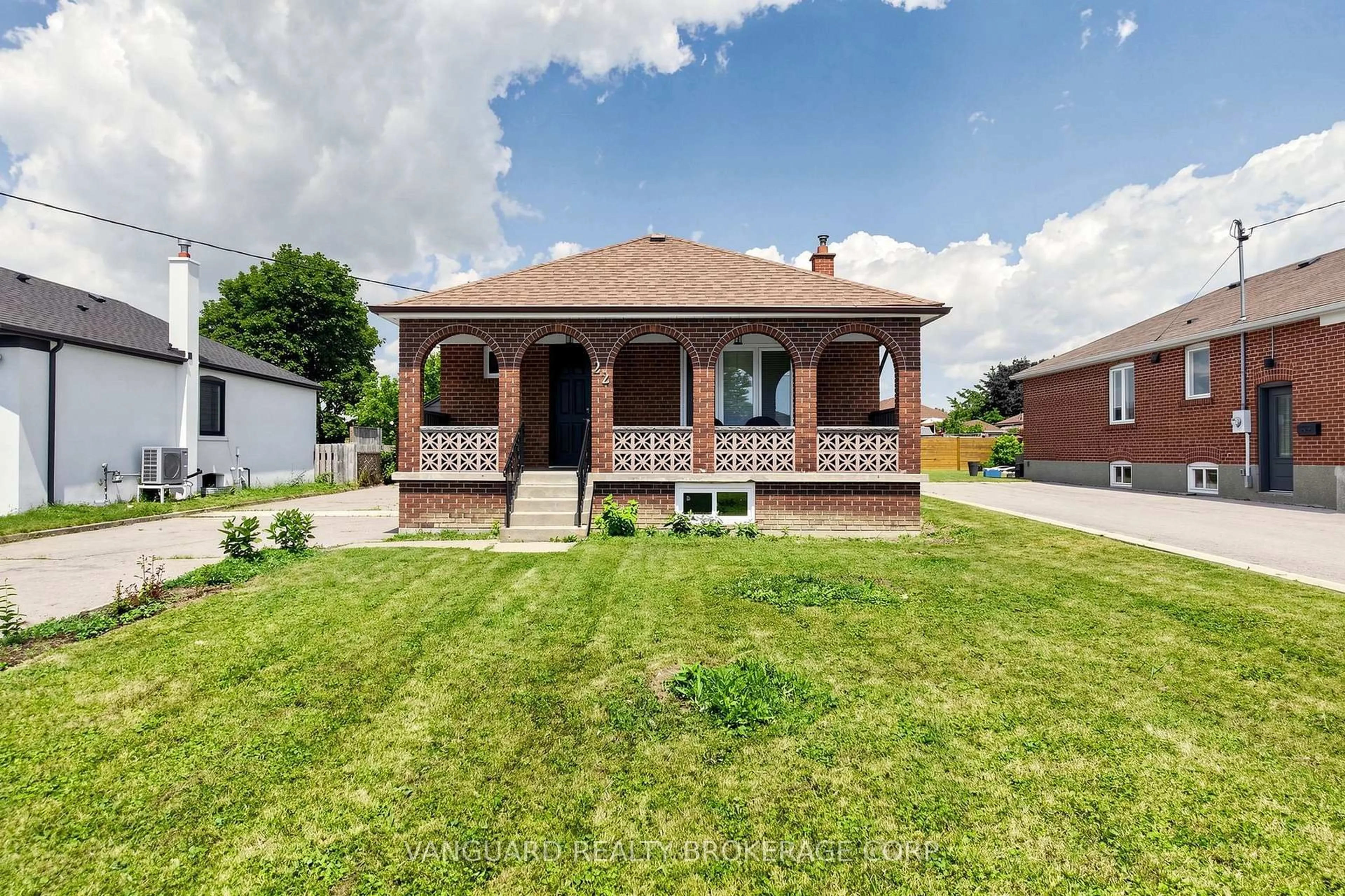 Home with brick exterior material, street for 22 Nash Dr, Toronto Ontario M3M 2L3