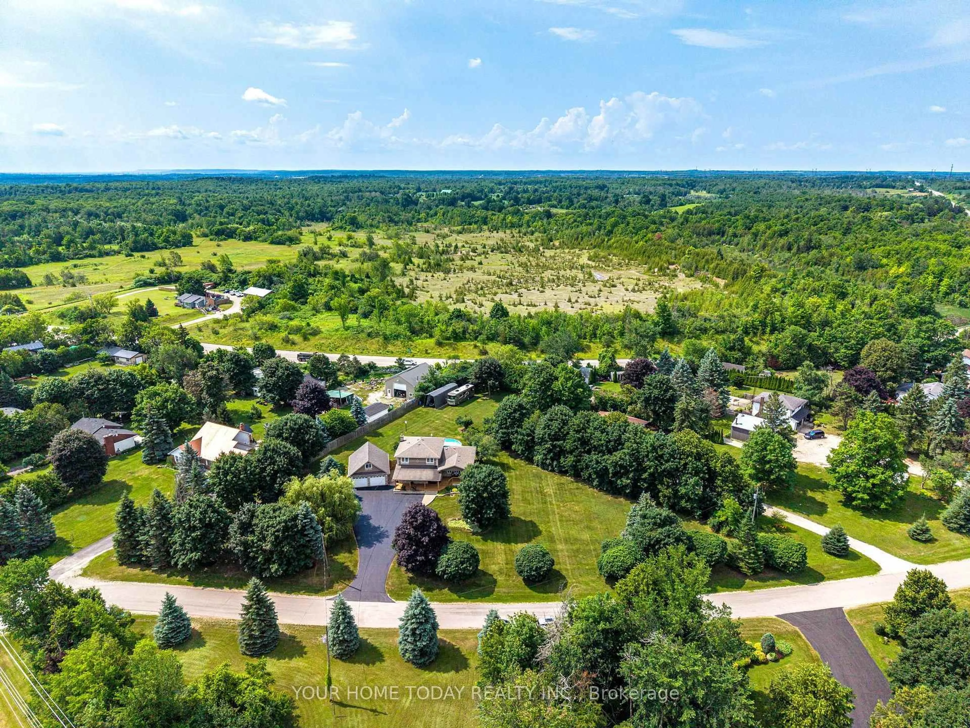 A pic from outside/outdoor area/front of a property/back of a property/a pic from drone, forest/trees view for 12950 Silvercreek Dr, Halton Hills Ontario L7G 4S4
