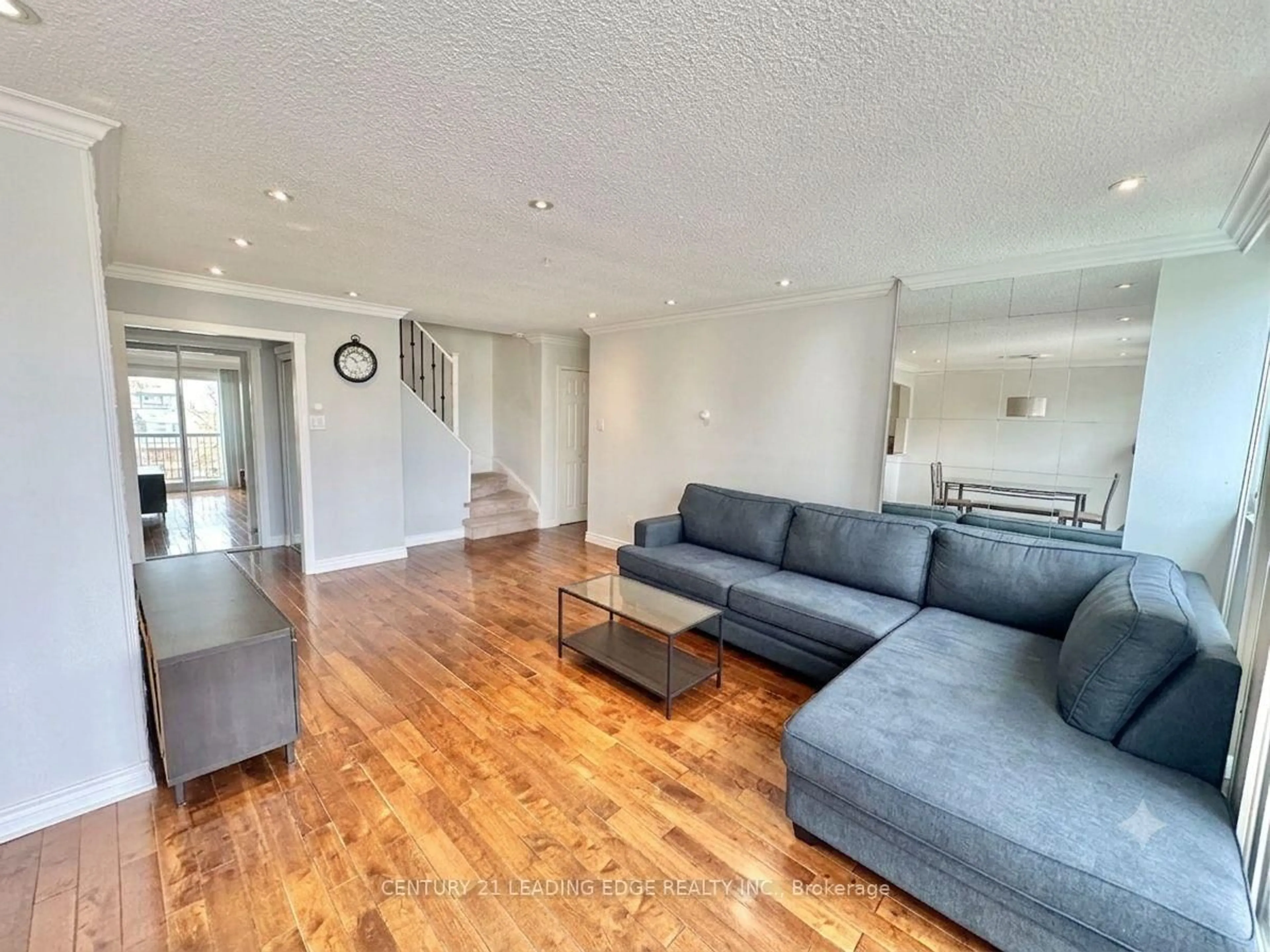 Living room with furniture, wood/laminate floor for 1624 Bloor St #82, Mississauga Ontario L4X 2S2