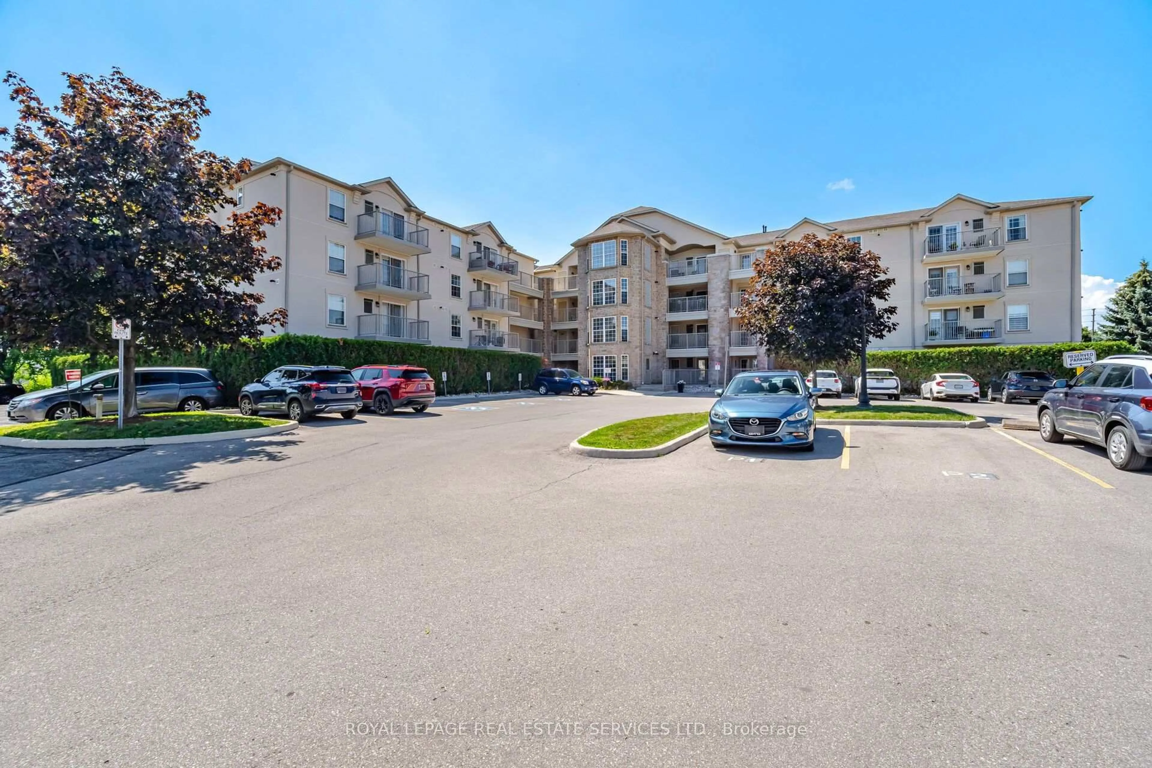 A pic from outside/outdoor area/front of a property/back of a property/a pic from drone, unknown for 1490 Bishops Gate #209, Oakville Ontario L6M 4N3