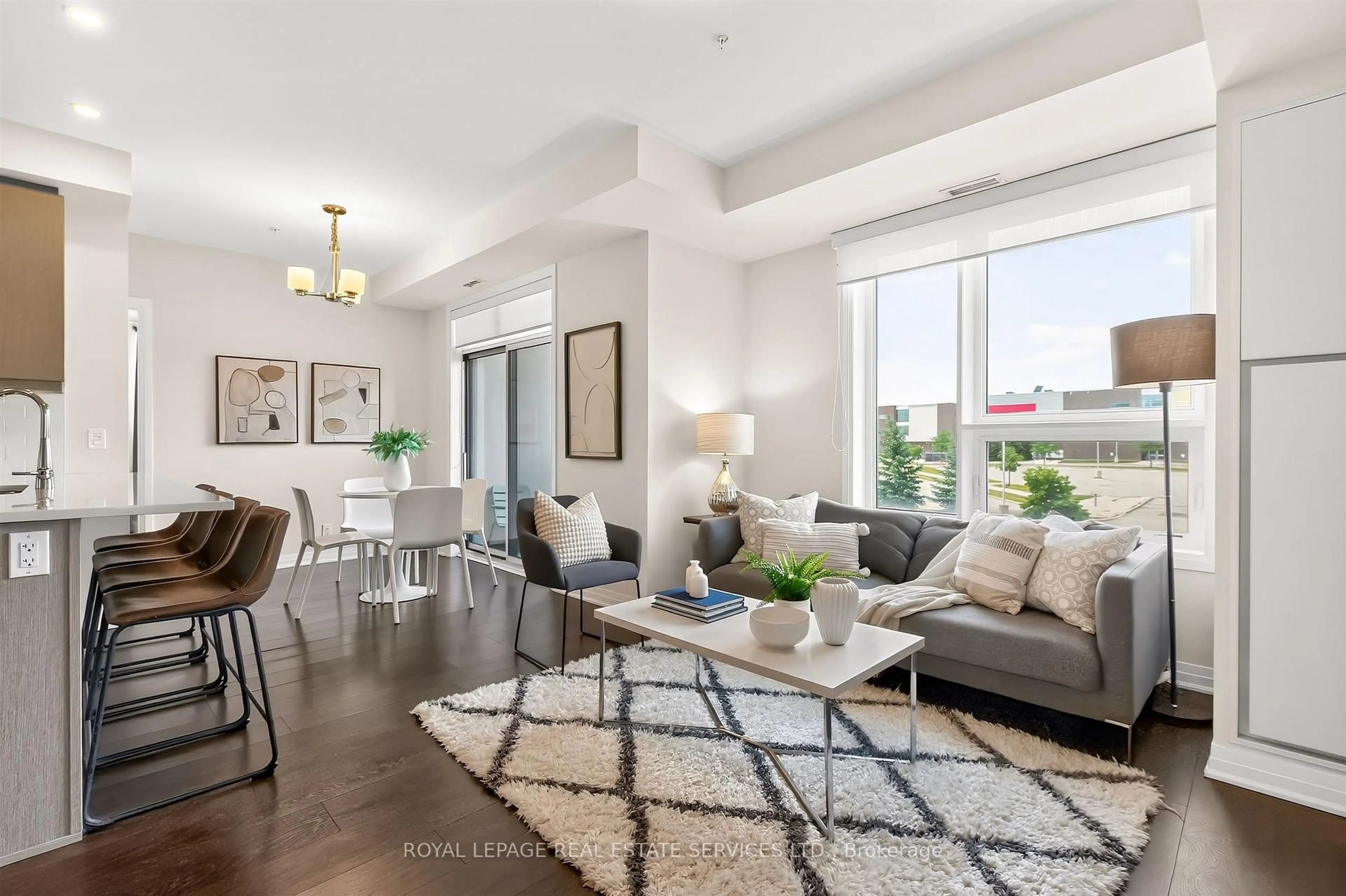Living room with furniture, unknown for 1105 Leger Way #209, Milton Ontario L9E 1K7