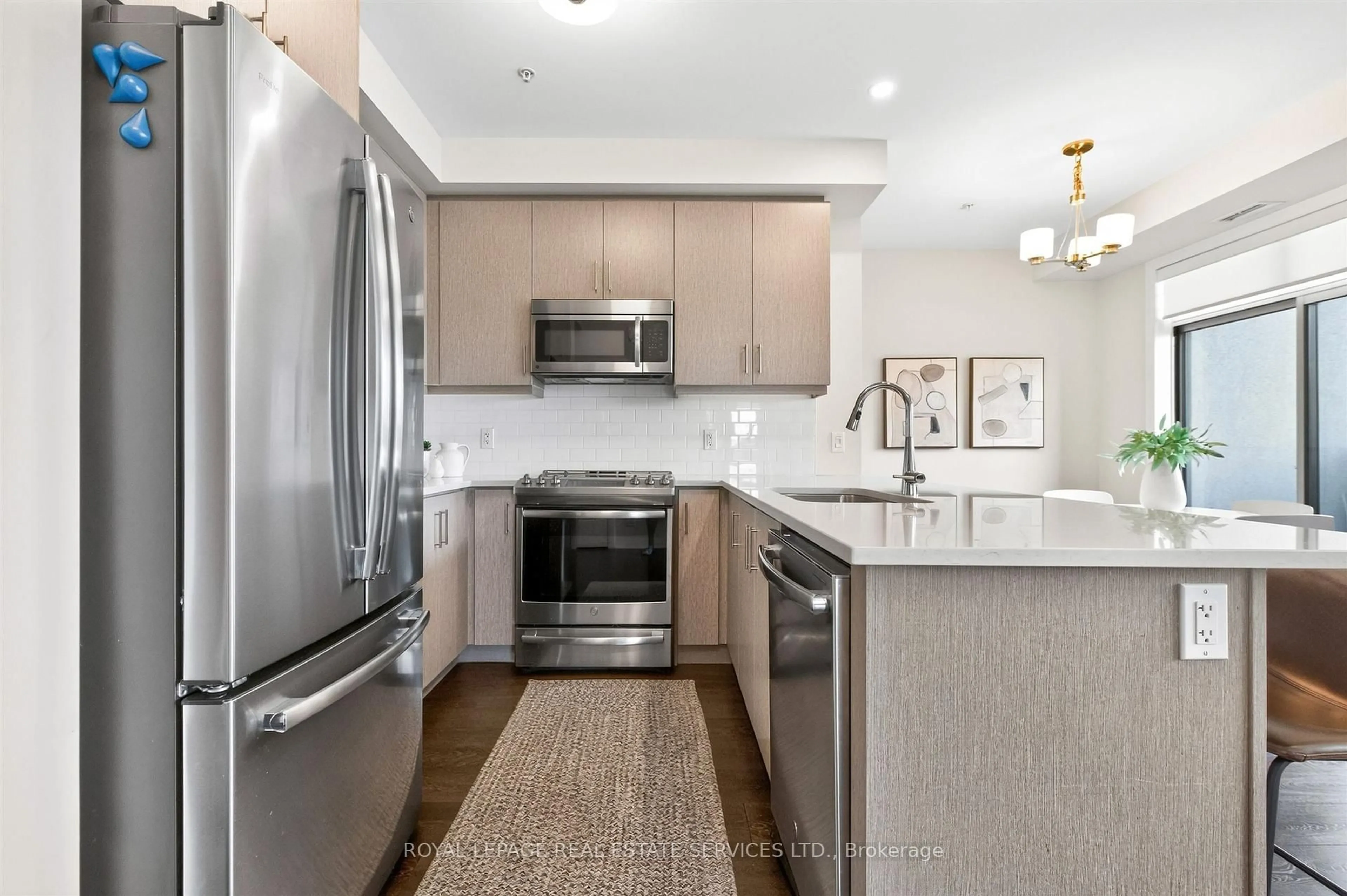 Open concept kitchen, unknown for 1105 Leger Way #209, Milton Ontario L9E 1K7