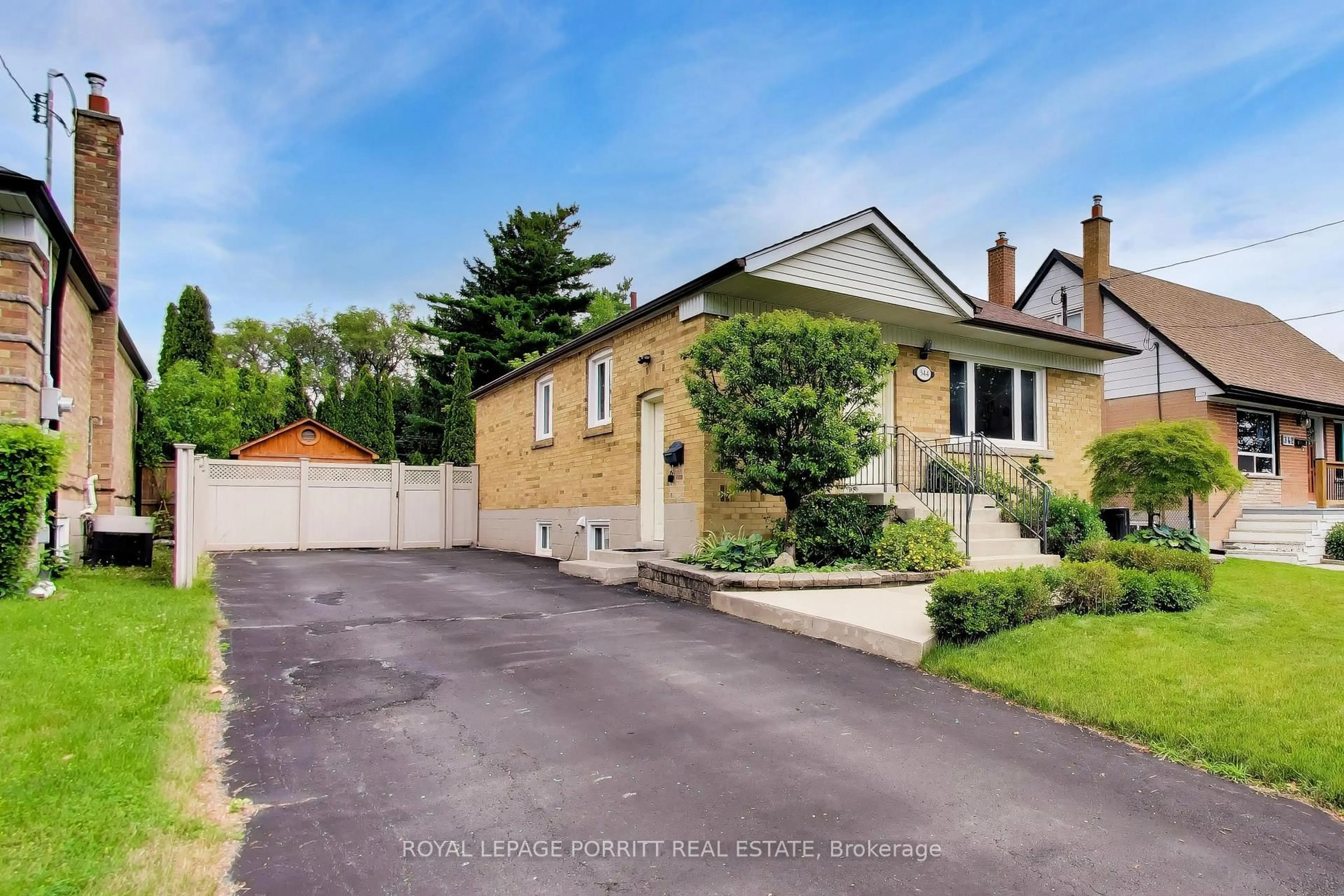 A pic from outside/outdoor area/front of a property/back of a property/a pic from drone, street for 344 Rimilton Ave, Toronto Ontario M8W 2E6