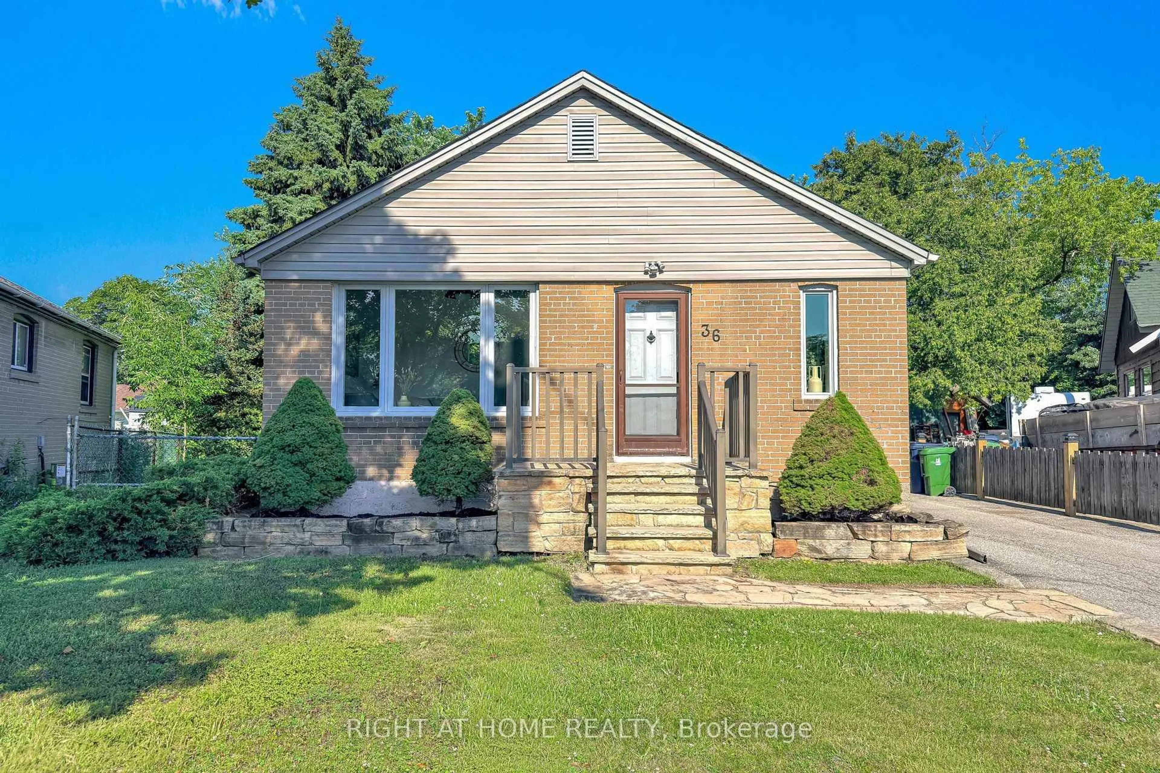 Home with brick exterior material, street for 36 Huntsmoor Rd, Toronto Ontario M9W 3R5