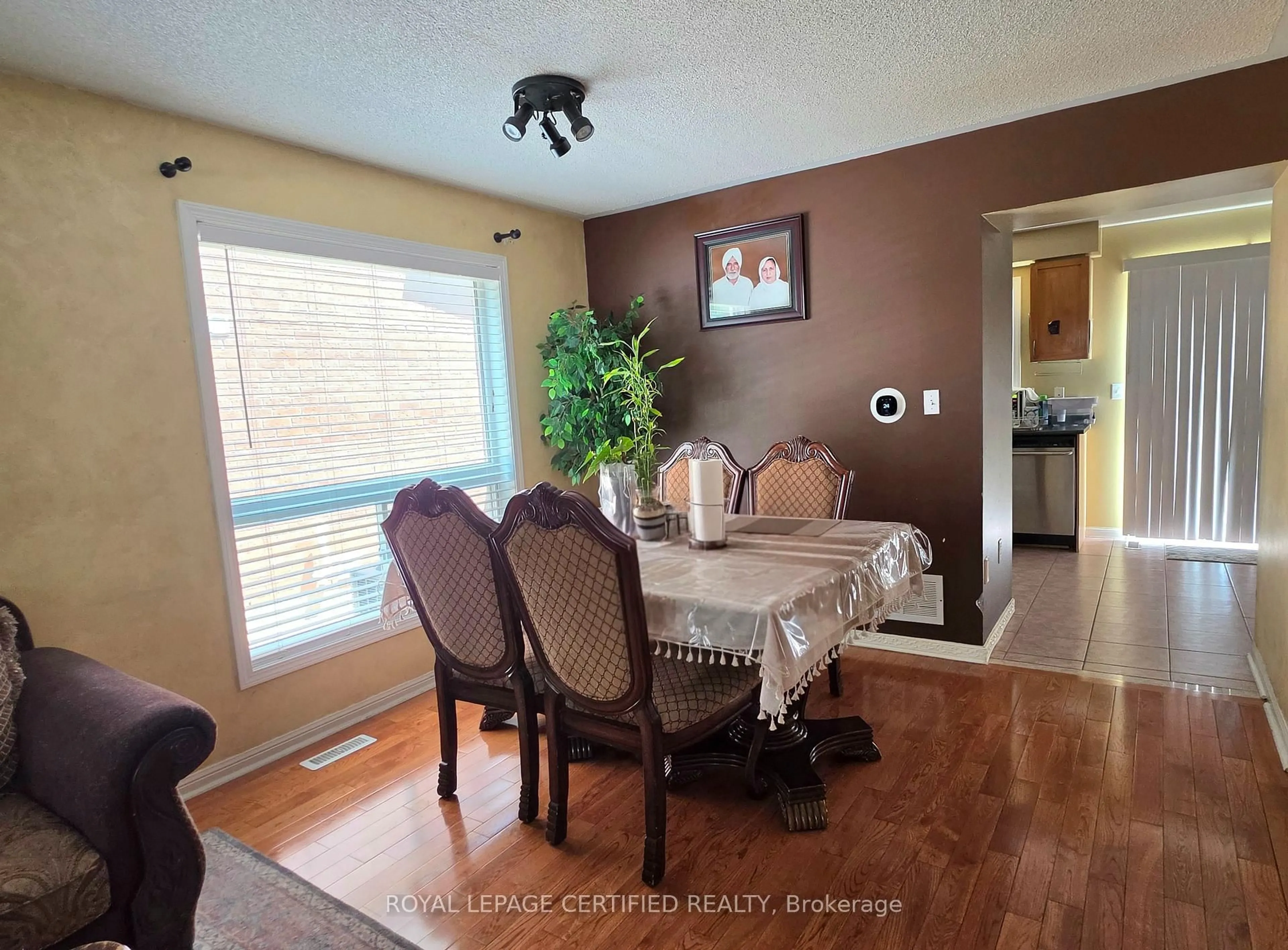 Dining room, wood/laminate floor for 7 Penn Dr, Brampton Ontario L7A 1P5