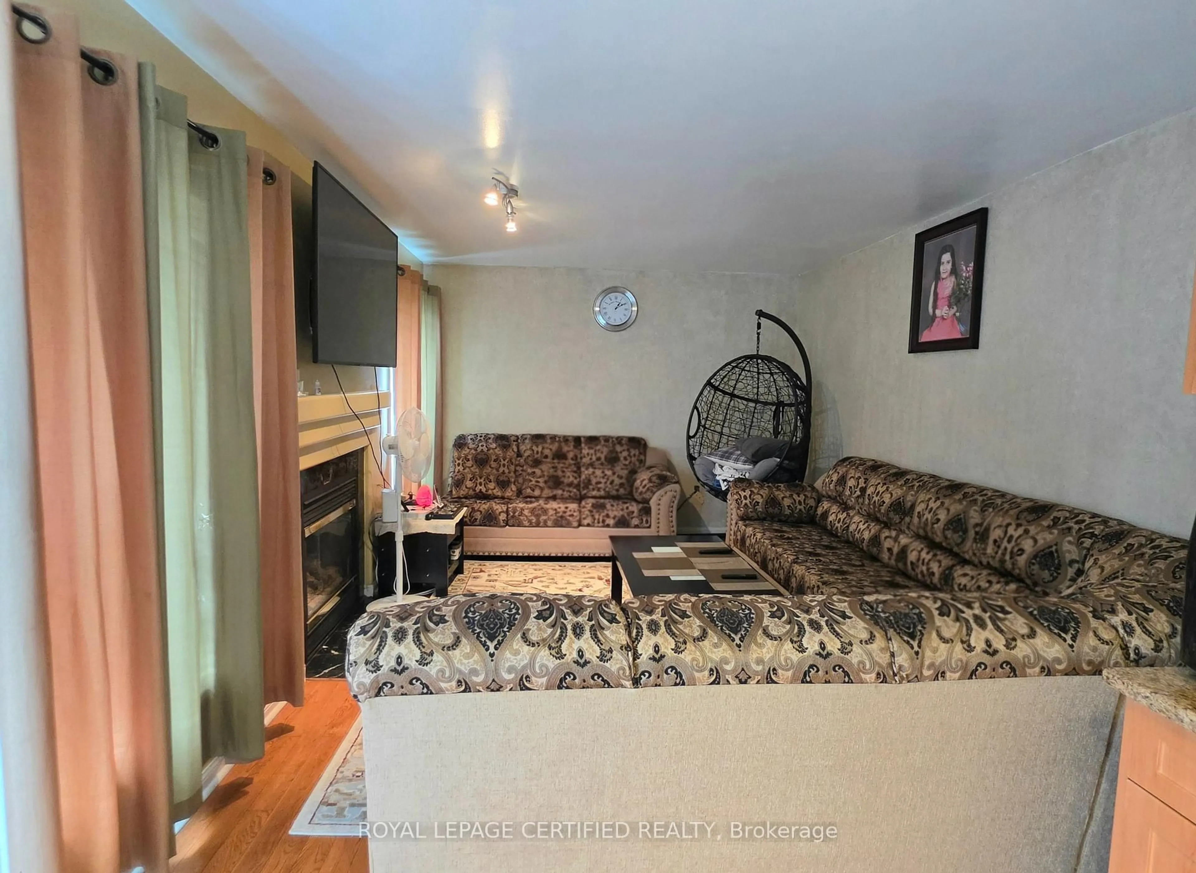 Living room with furniture, unknown for 7 Penn Dr, Brampton Ontario L7A 1P5