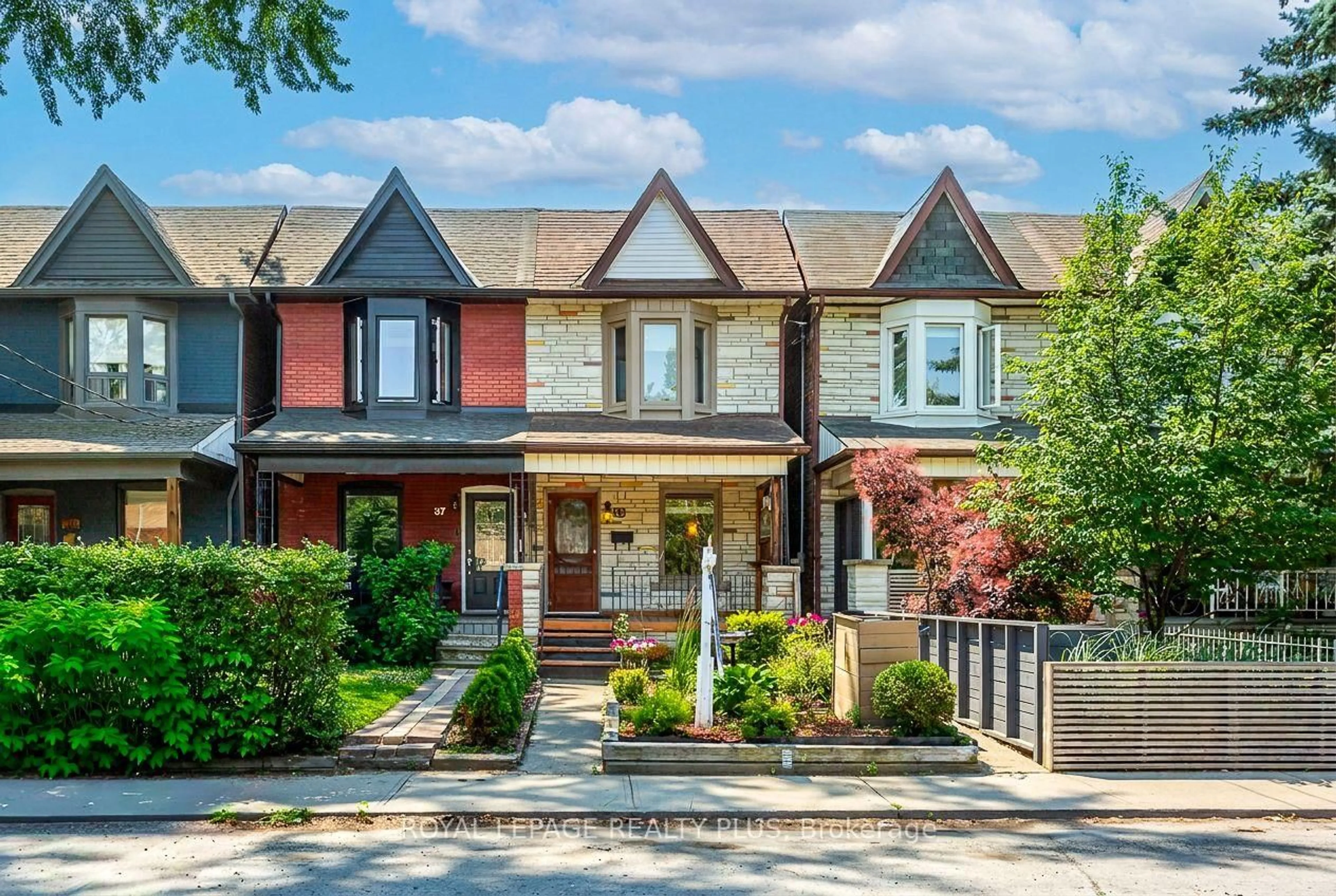Home with brick exterior material, street for 39 Maria St, Toronto Ontario M6P 1W1