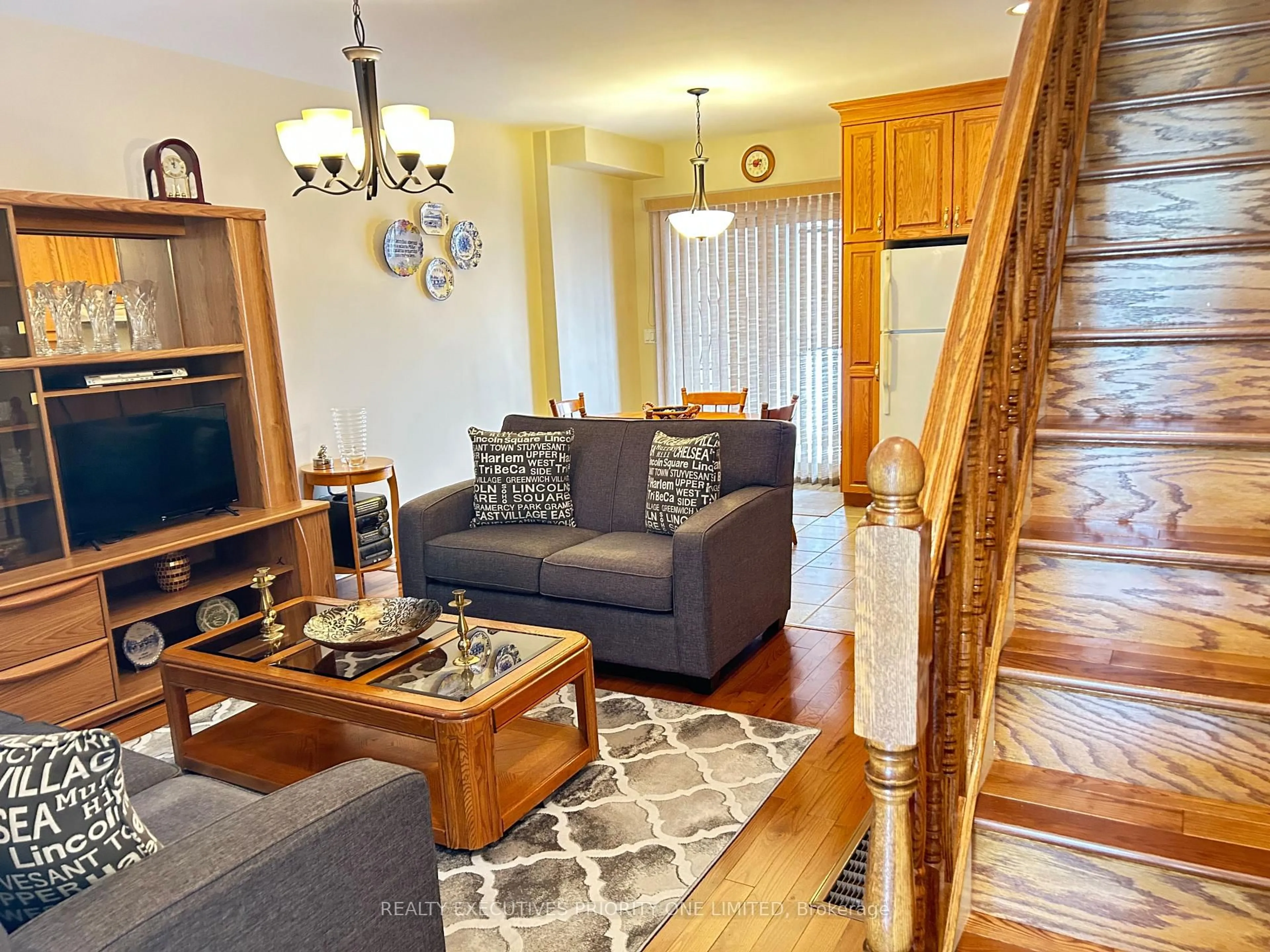 Living room with furniture, wood/laminate floor for 224 Caledonia Rd, Toronto Ontario M6E 4T1