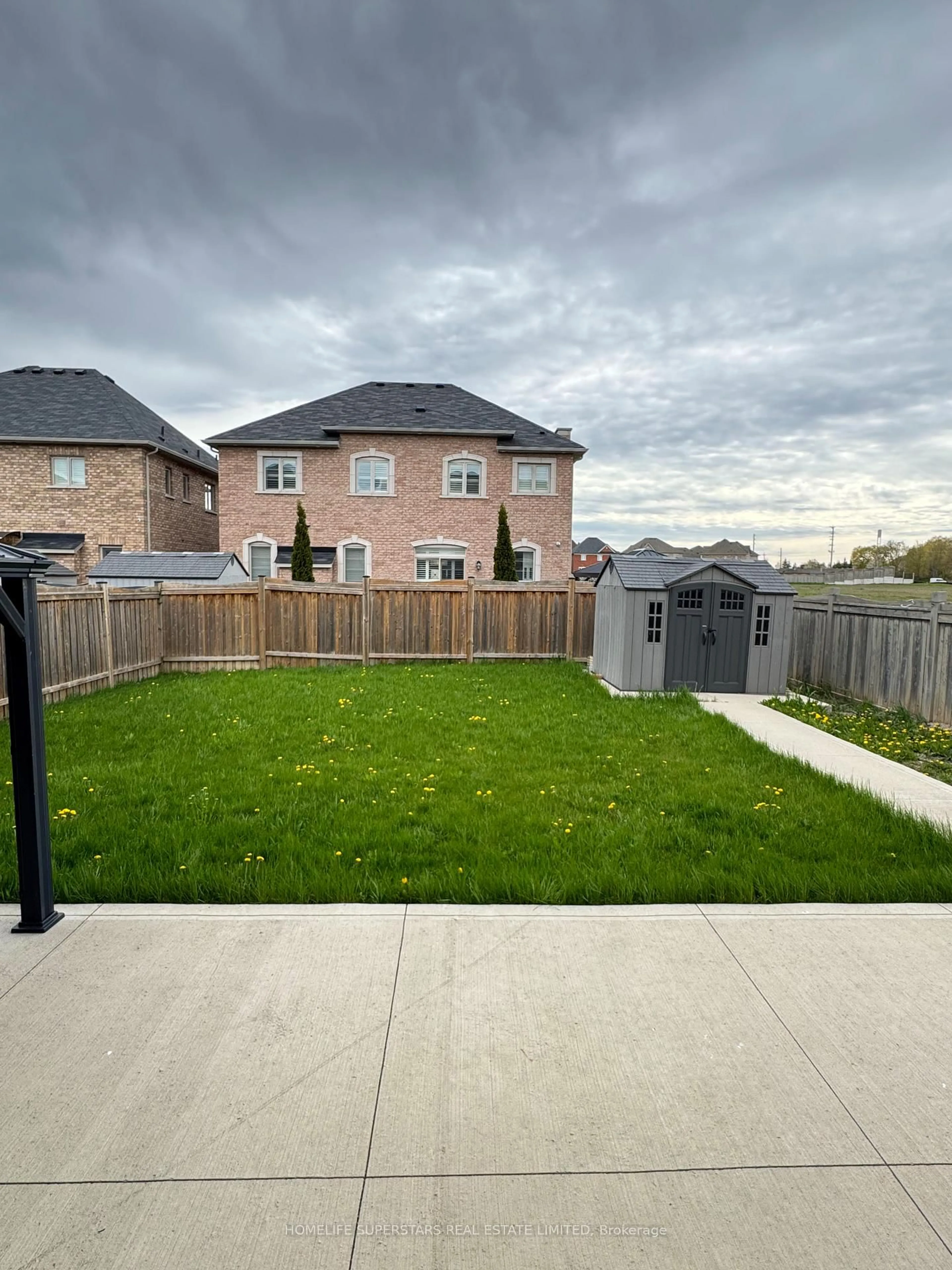 A pic from outside/outdoor area/front of a property/back of a property/a pic from drone, street for 126 Martin Byrne Dr, Brampton Ontario L6P 4C7