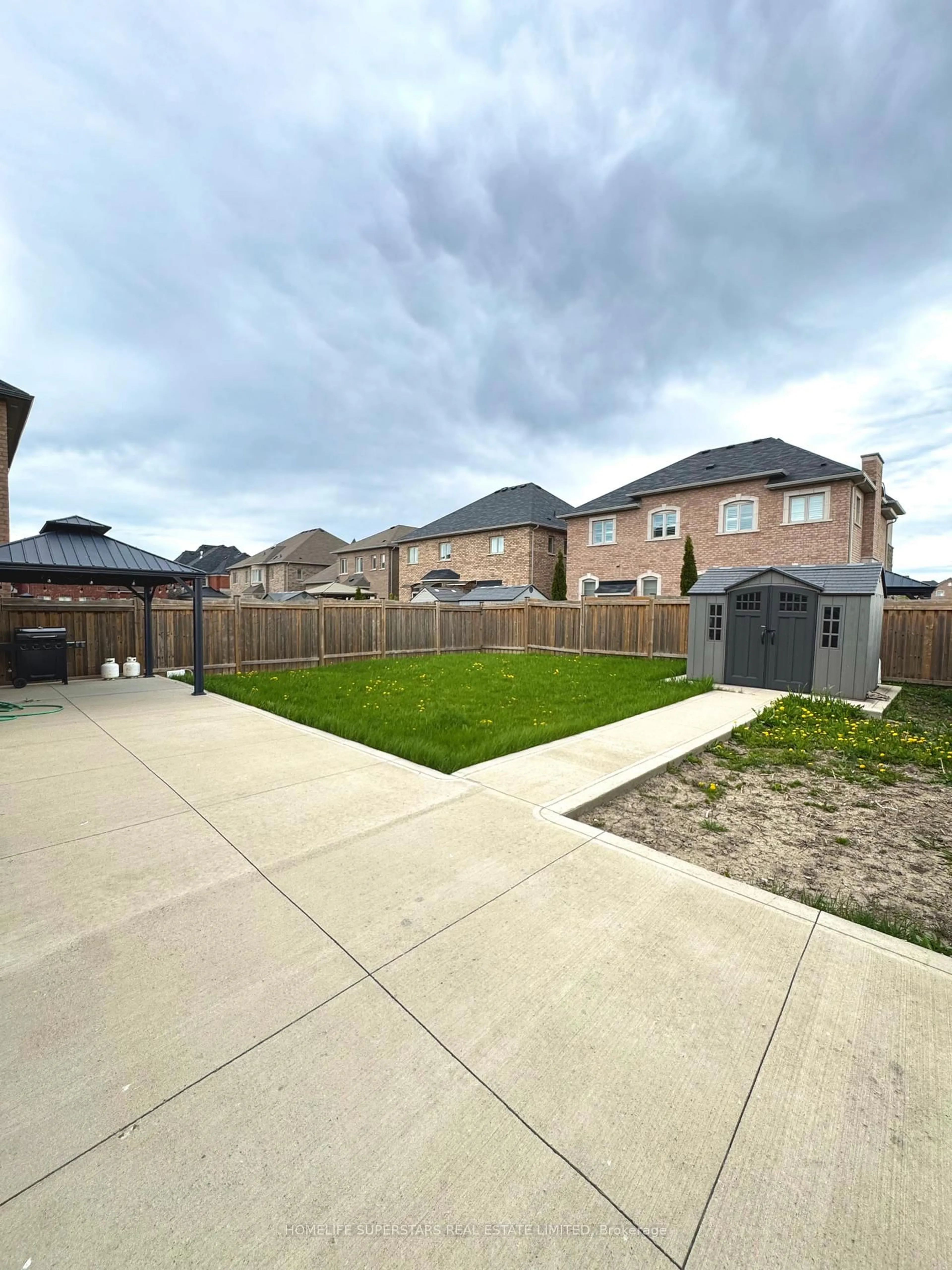 A pic from outside/outdoor area/front of a property/back of a property/a pic from drone, street for 126 Martin Byrne Dr, Brampton Ontario L6P 4C7