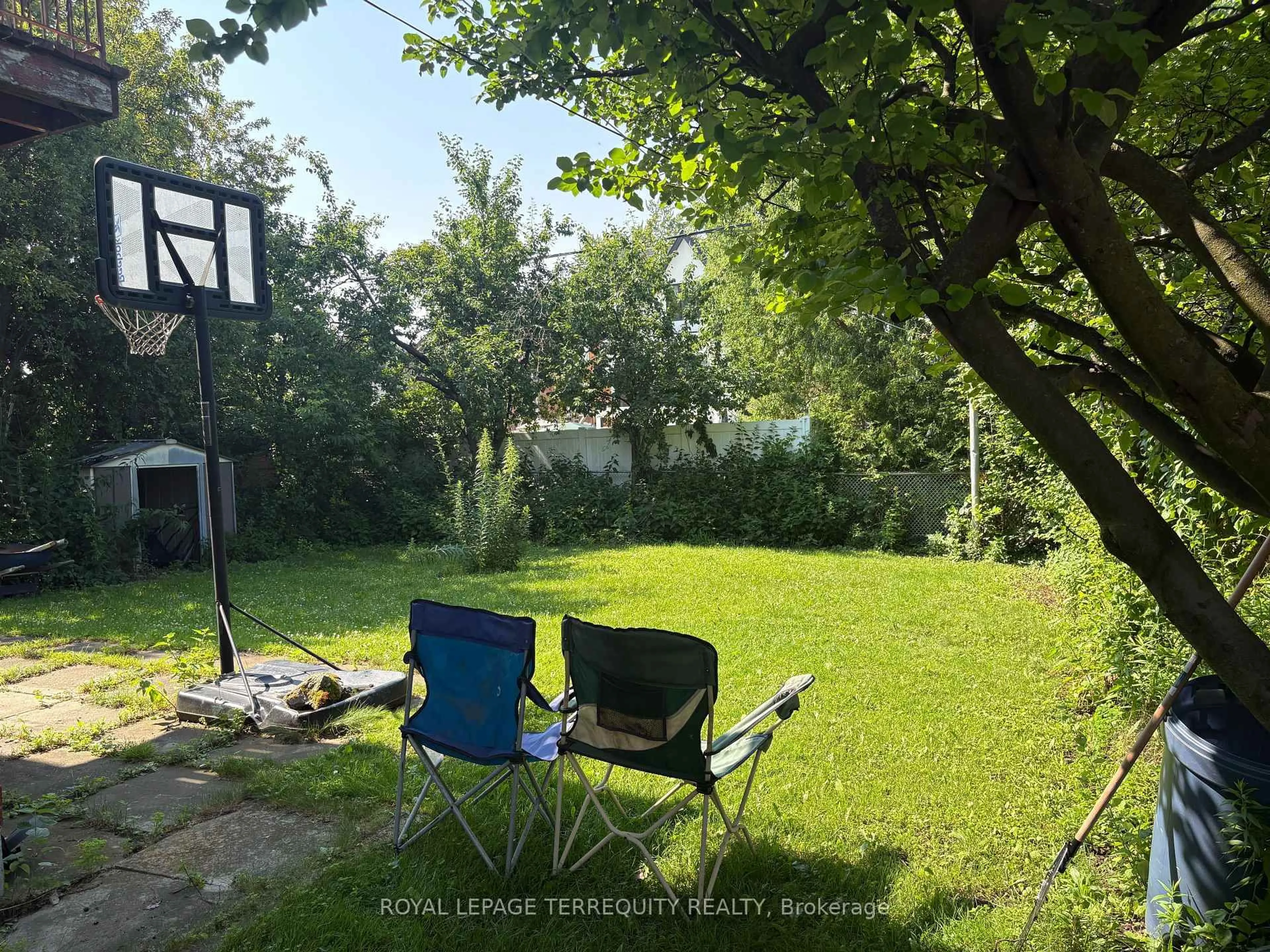 A pic from outside/outdoor area/front of a property/back of a property/a pic from drone, forest/trees view for 40 MacDonald St, Toronto Ontario M8V 1Y4