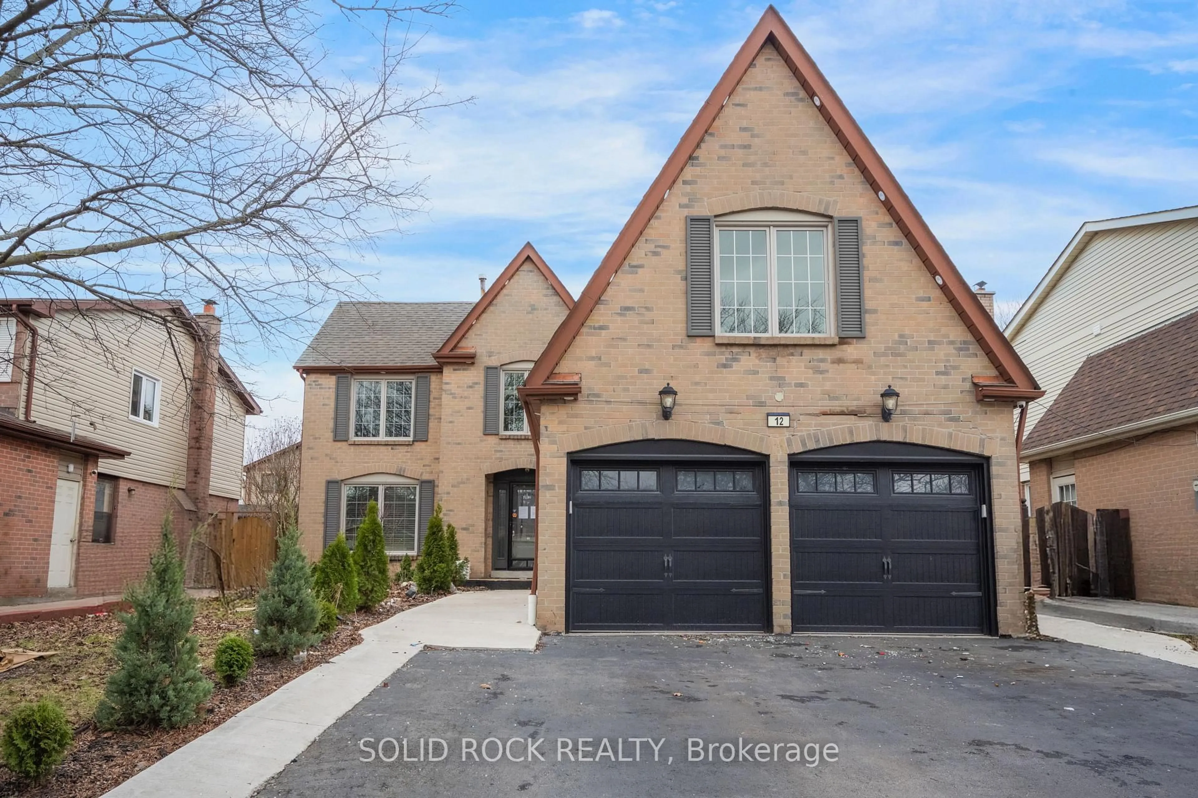 Home with brick exterior material, street for 12 Torrance Woods, Brampton Ontario L6Y 2N3