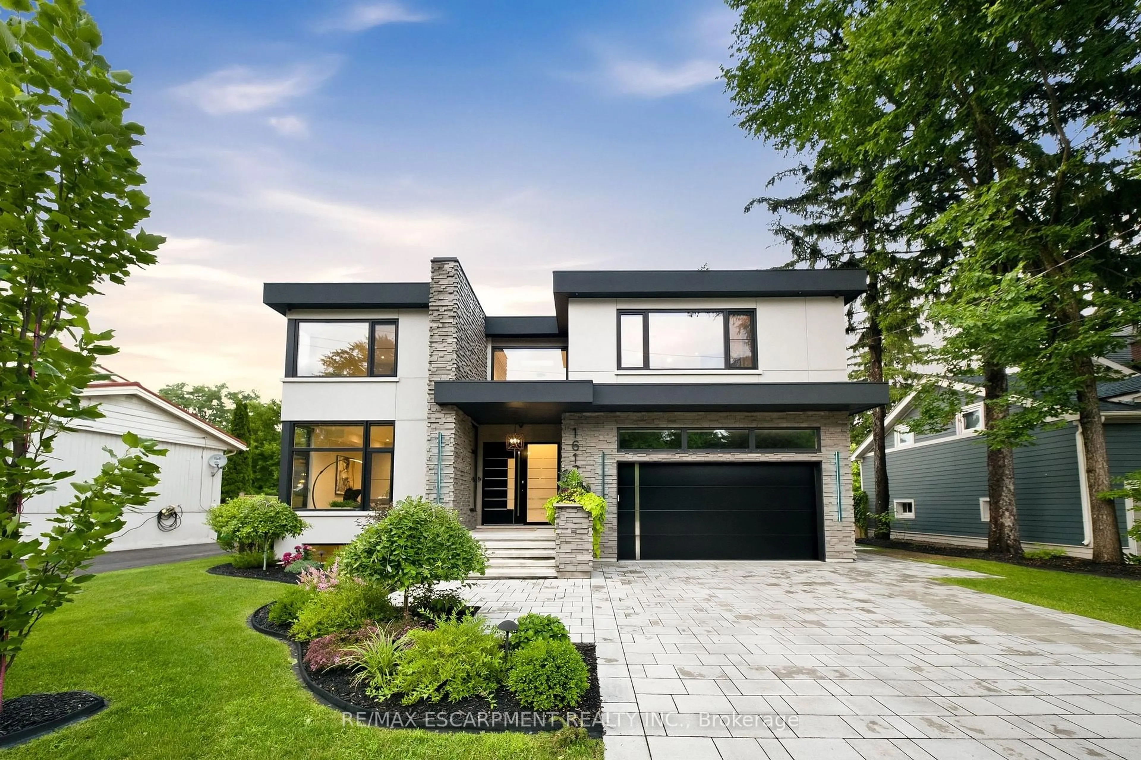 Home with brick exterior material, street for 1617 Trotwood Ave, Mississauga Ontario L5G 3Z8