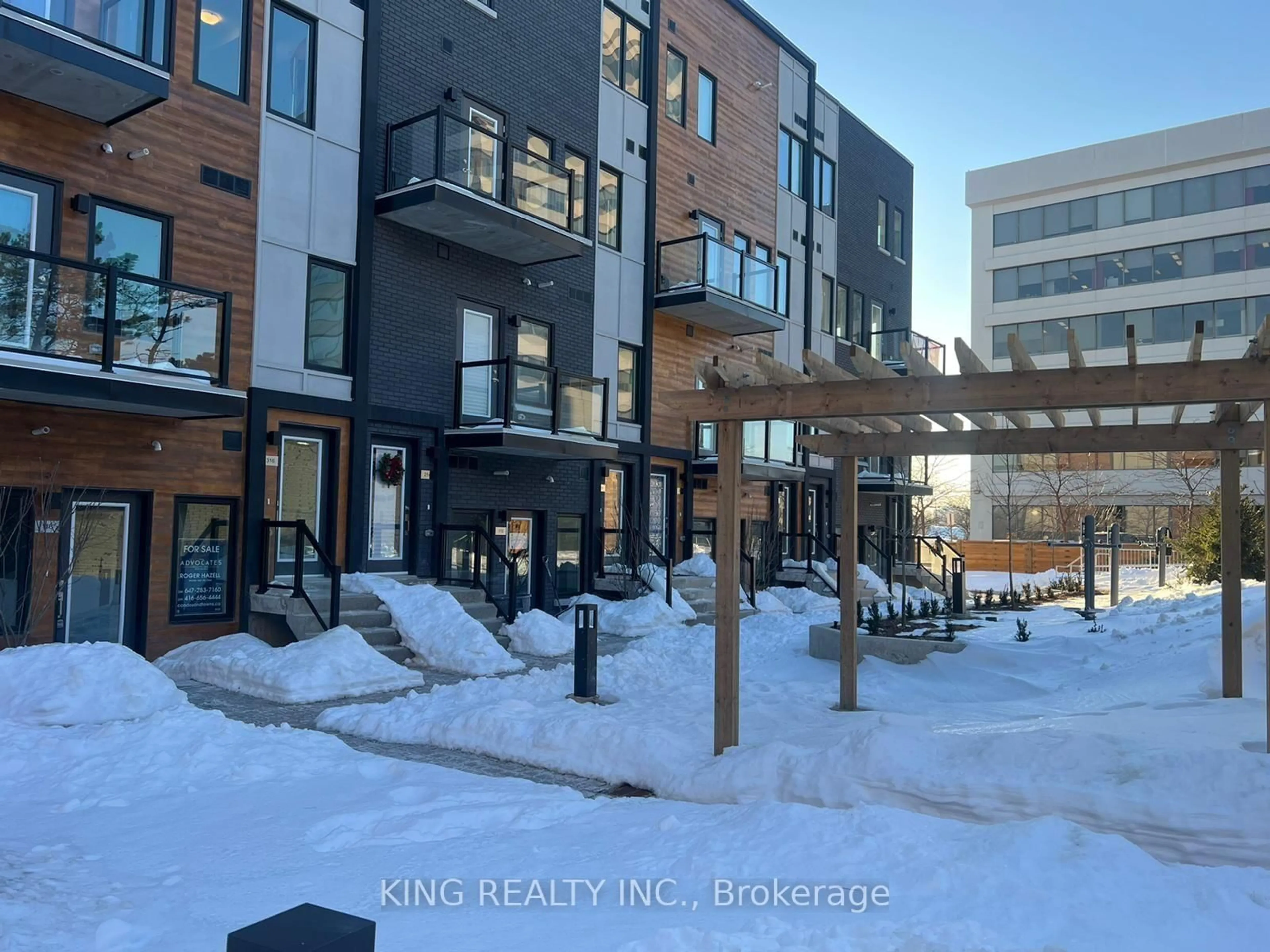 A pic from outside/outdoor area/front of a property/back of a property/a pic from drone, unknown for 402 The Eastmall #315, Toronto Ontario M9B 3Z9