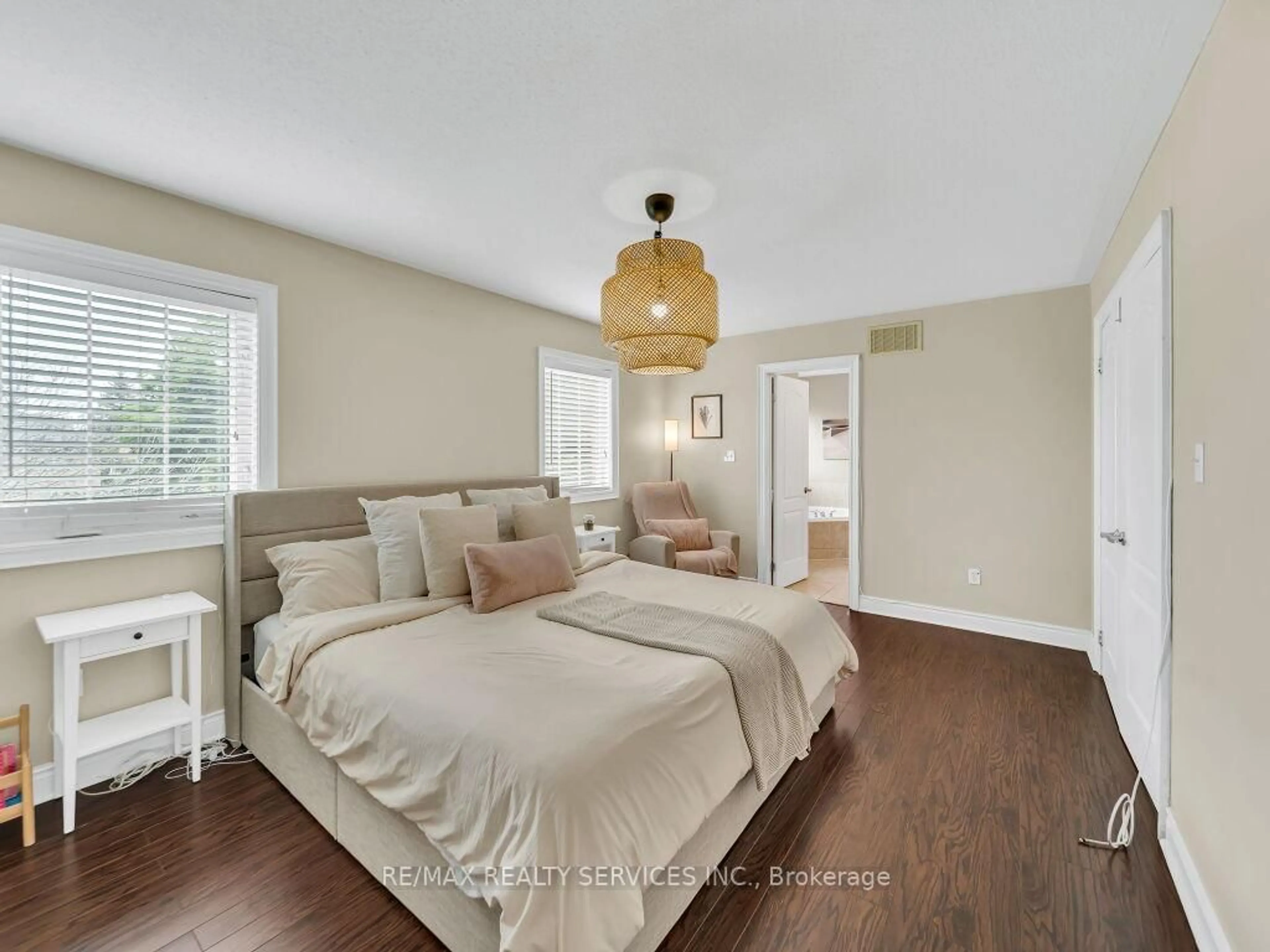 Bedroom with bed, wood/laminate floor for 122 Dells Cres, Brampton Ontario L7A 2X1
